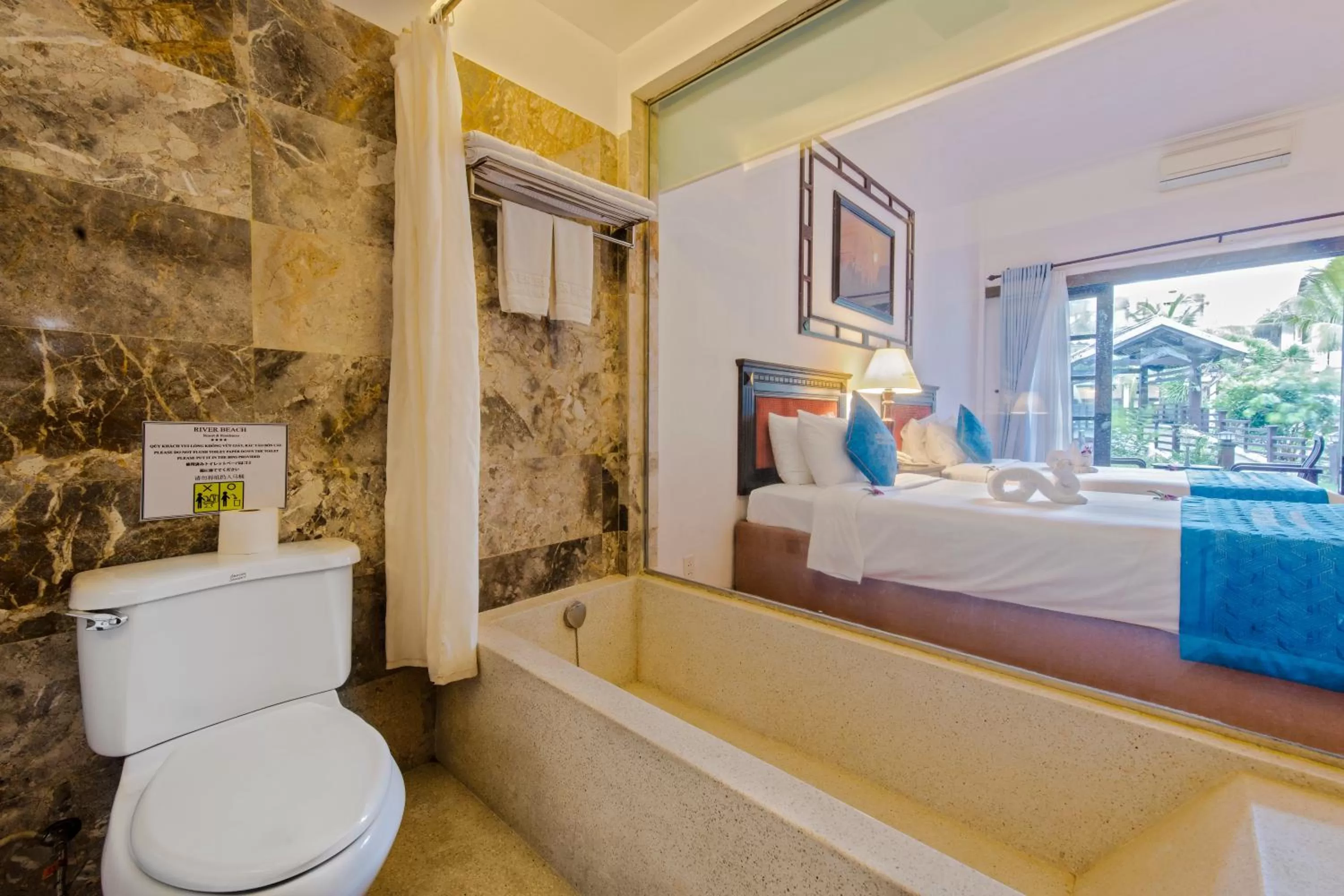 Bathroom, Bed in River Beach Resort & Residences