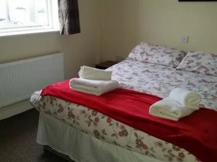 Bed in Guest House @ The Bear