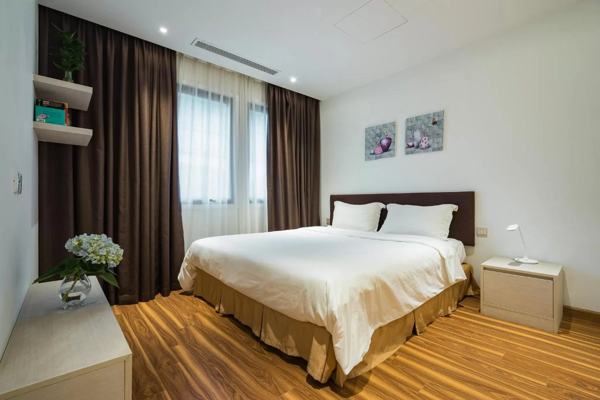 Bed in HNC Premier Hotel & Residences