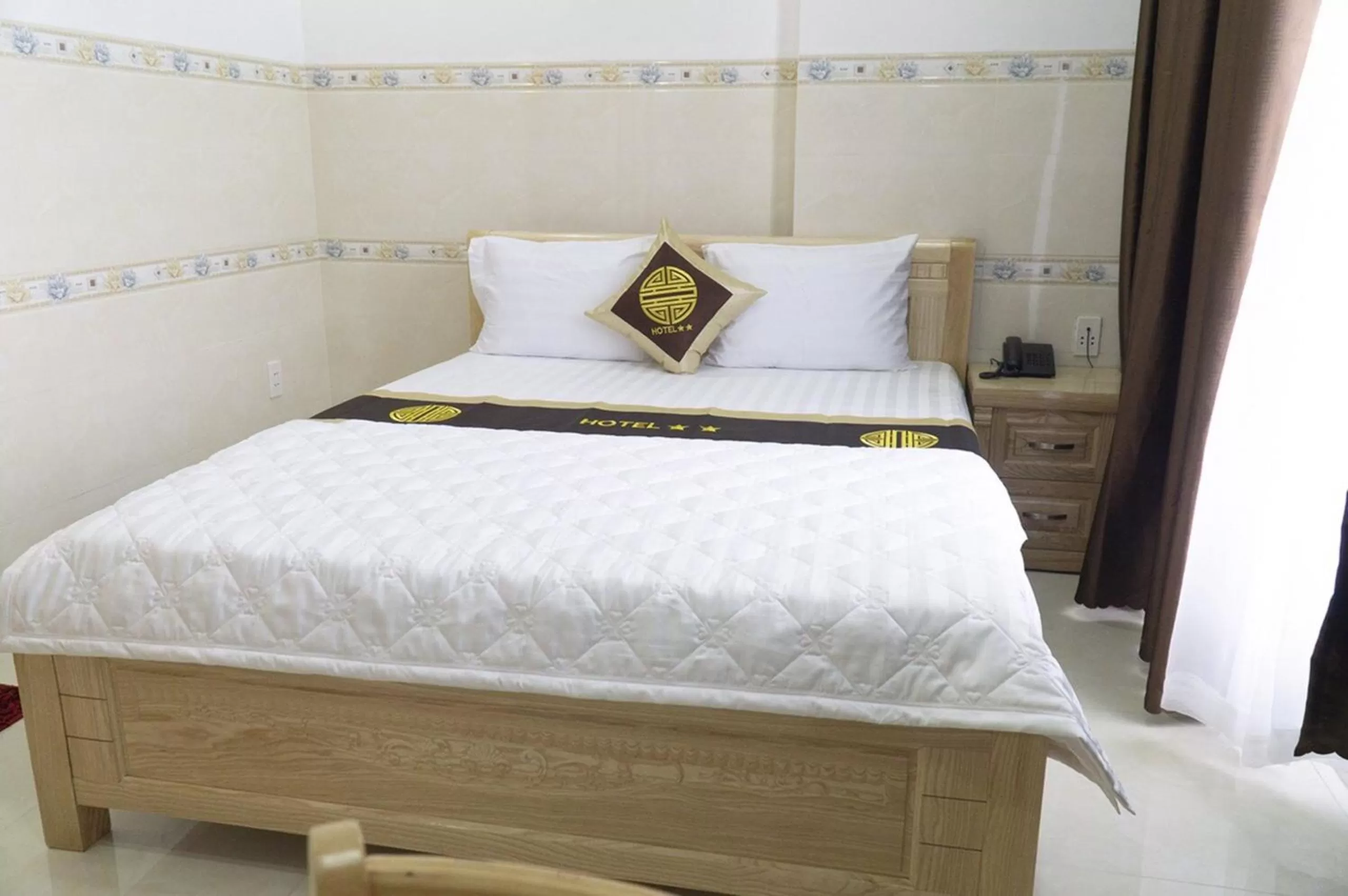 Bedroom, Bed in Dai An Binh Tan Hotel