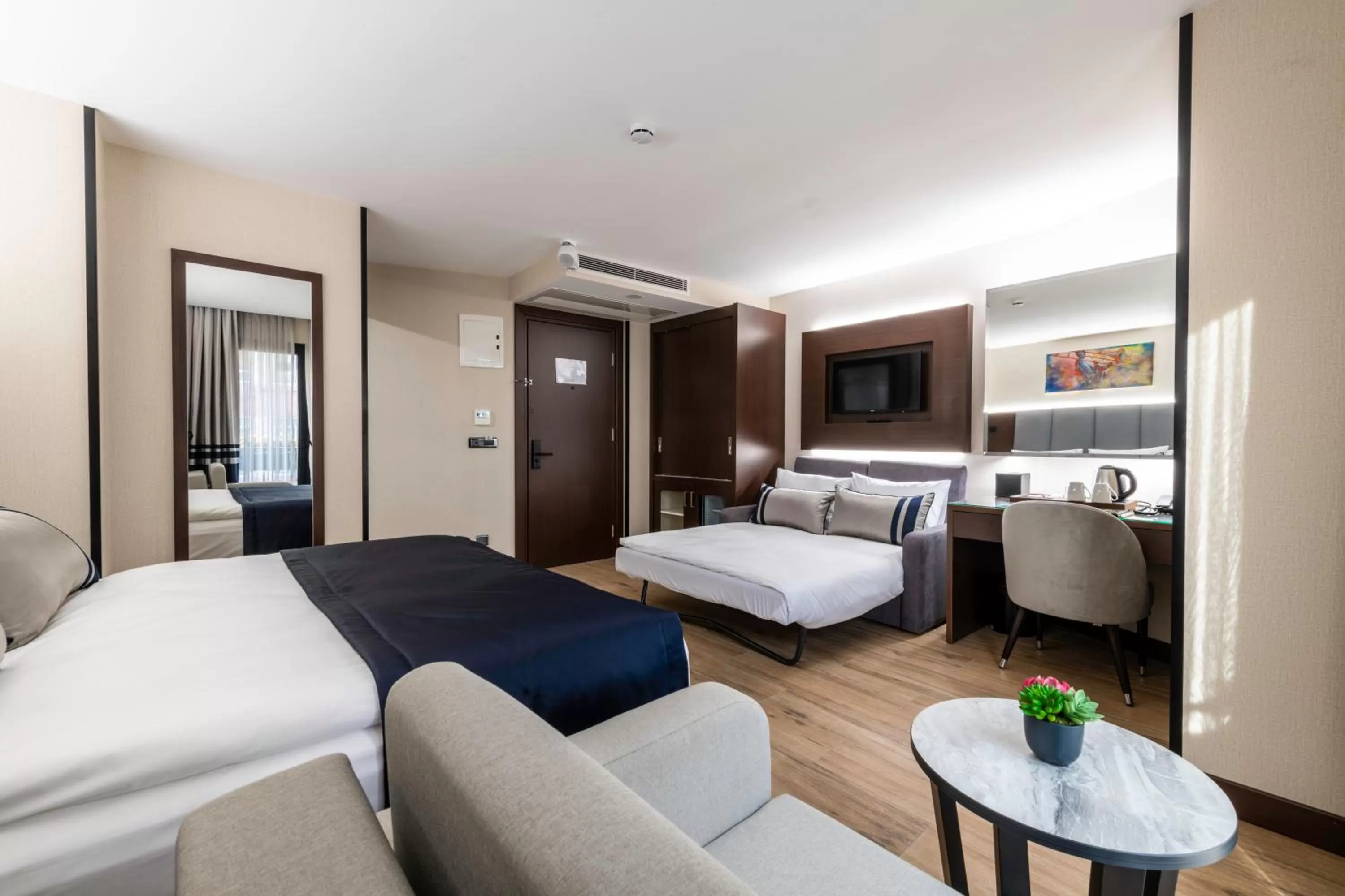 Bed in Aprilis Deluxe Hotel