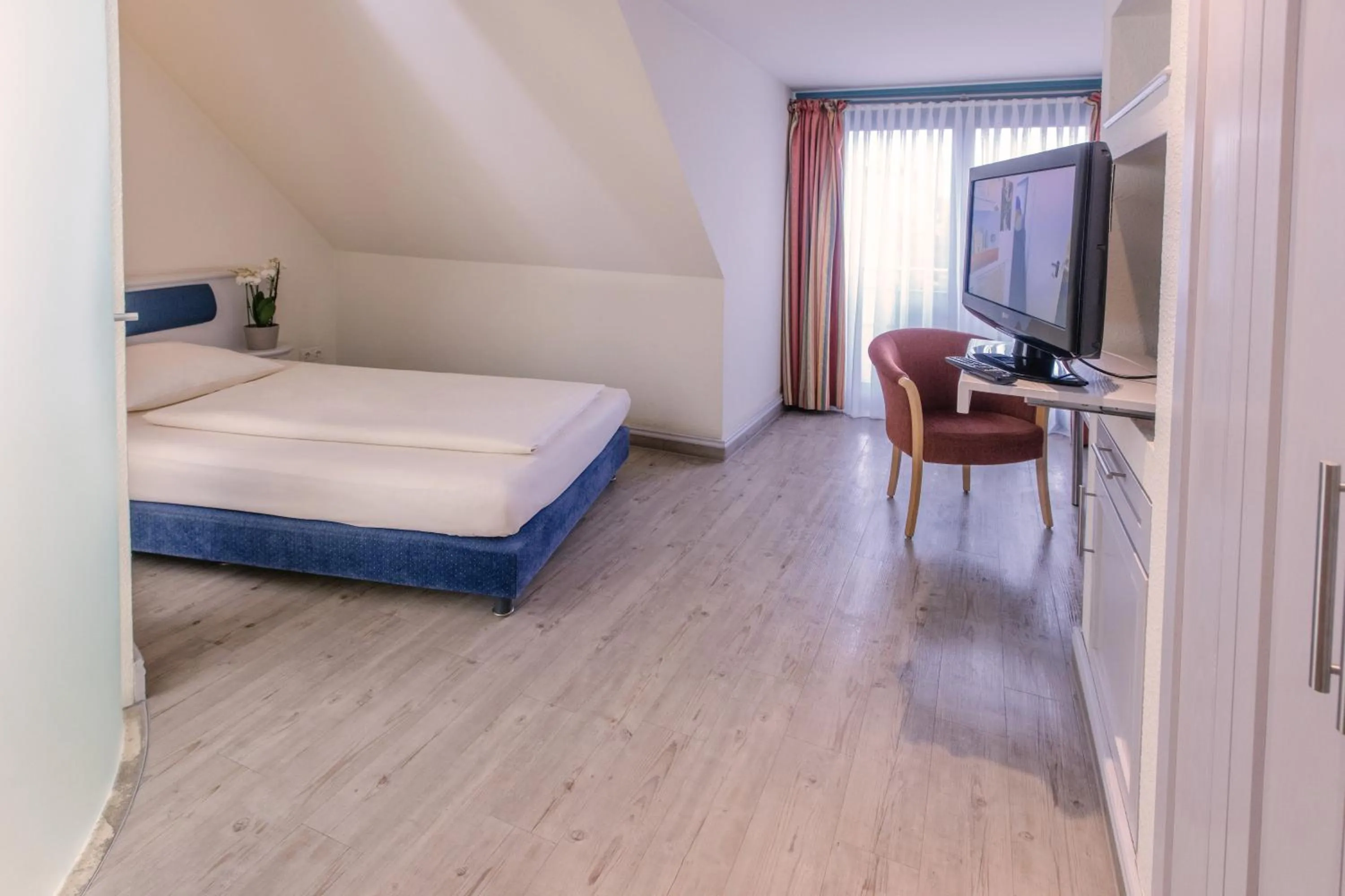 TV and multimedia, Bed in Hotel Gasthaus Rottner