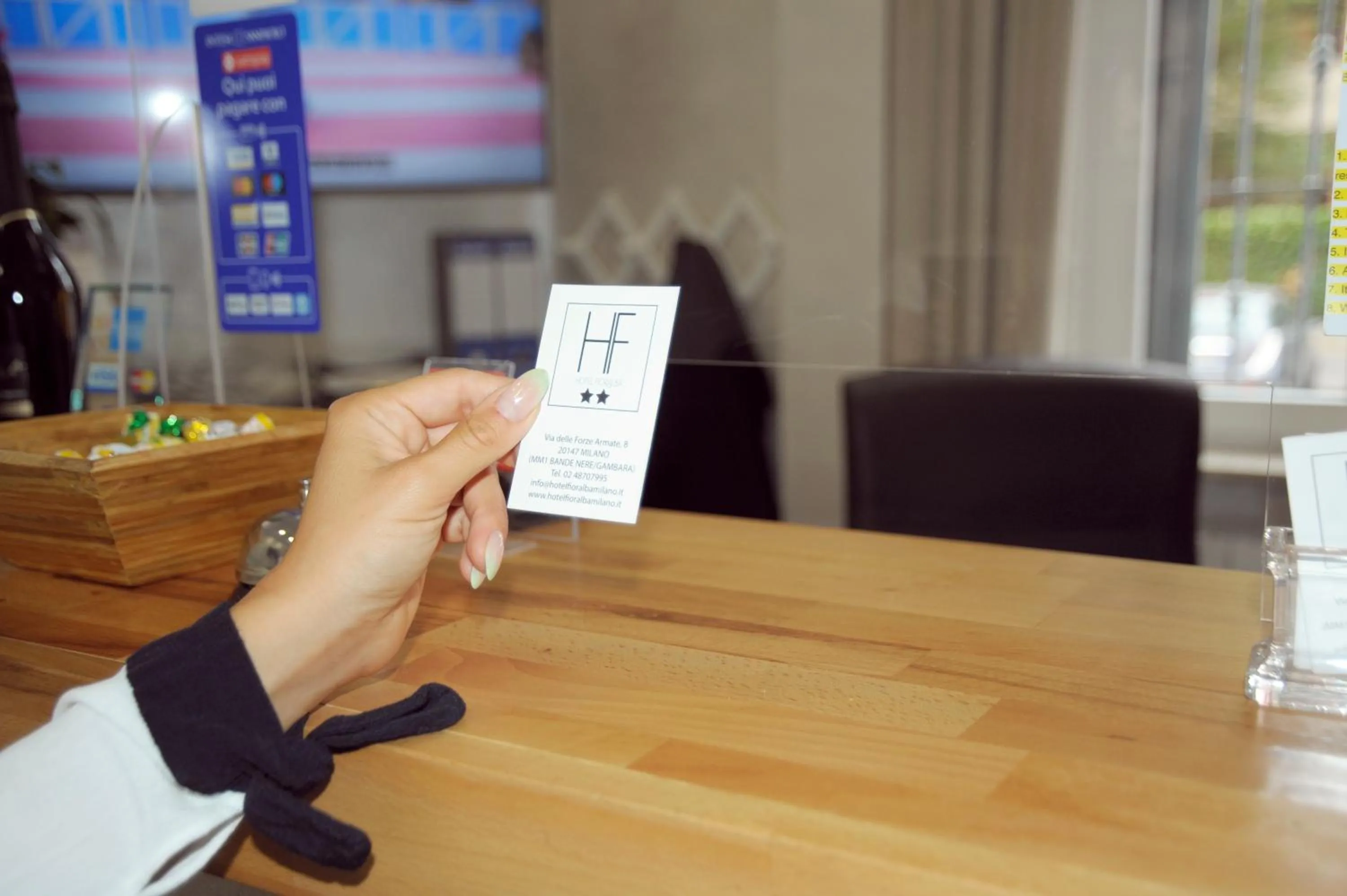 Property logo or sign in Hotel Fioralba