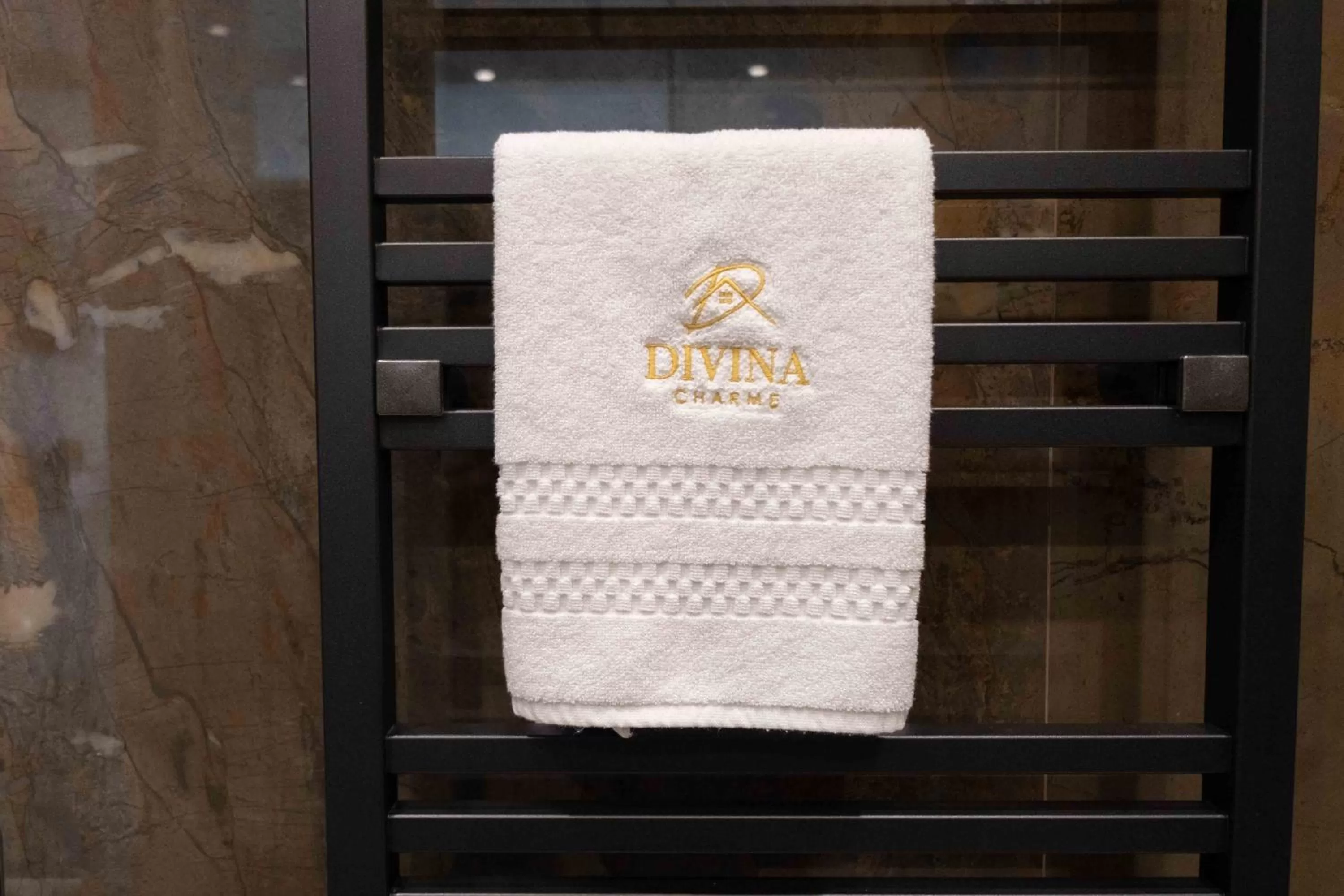 towels, Property Logo/Sign in Divina Charme