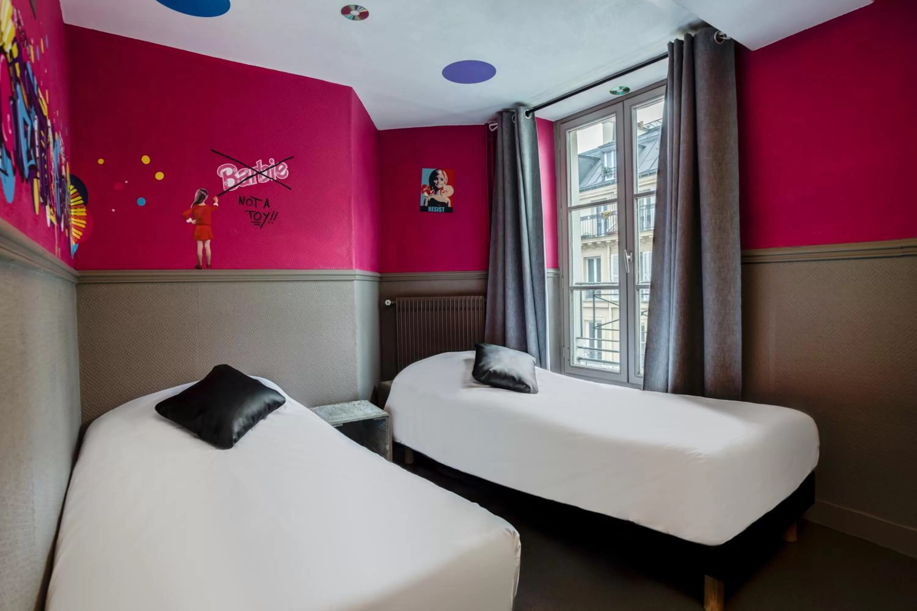 Bed in Absolute Hotel Paris République