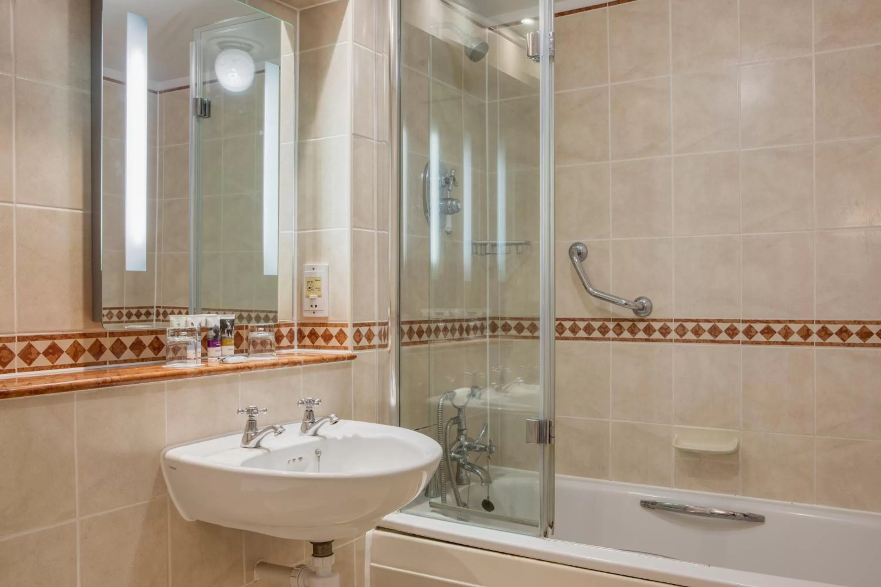 Bathroom in Winchester Wessex Hotel by Sunday