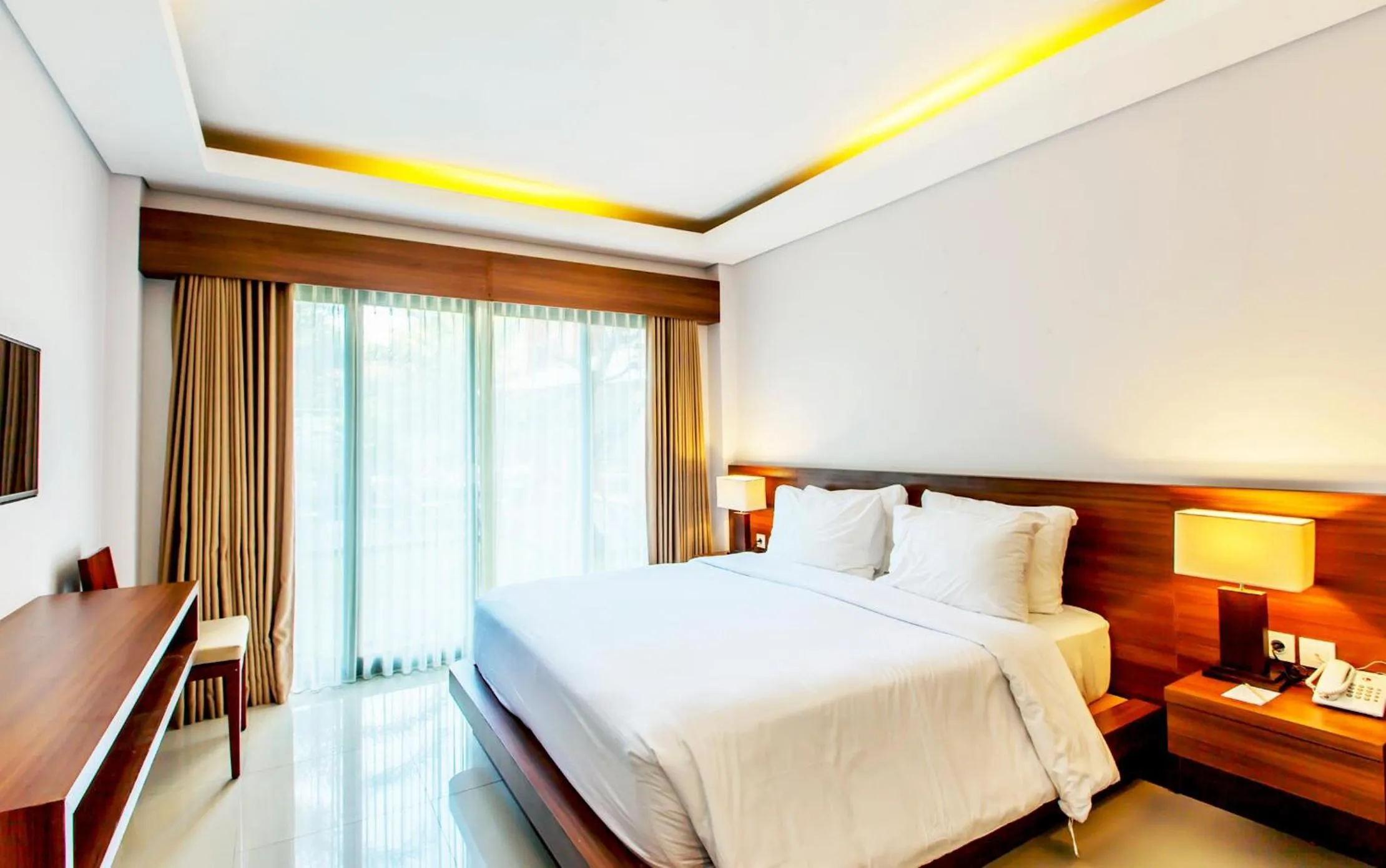 Bed in Grand Mirah Boutique Hotel