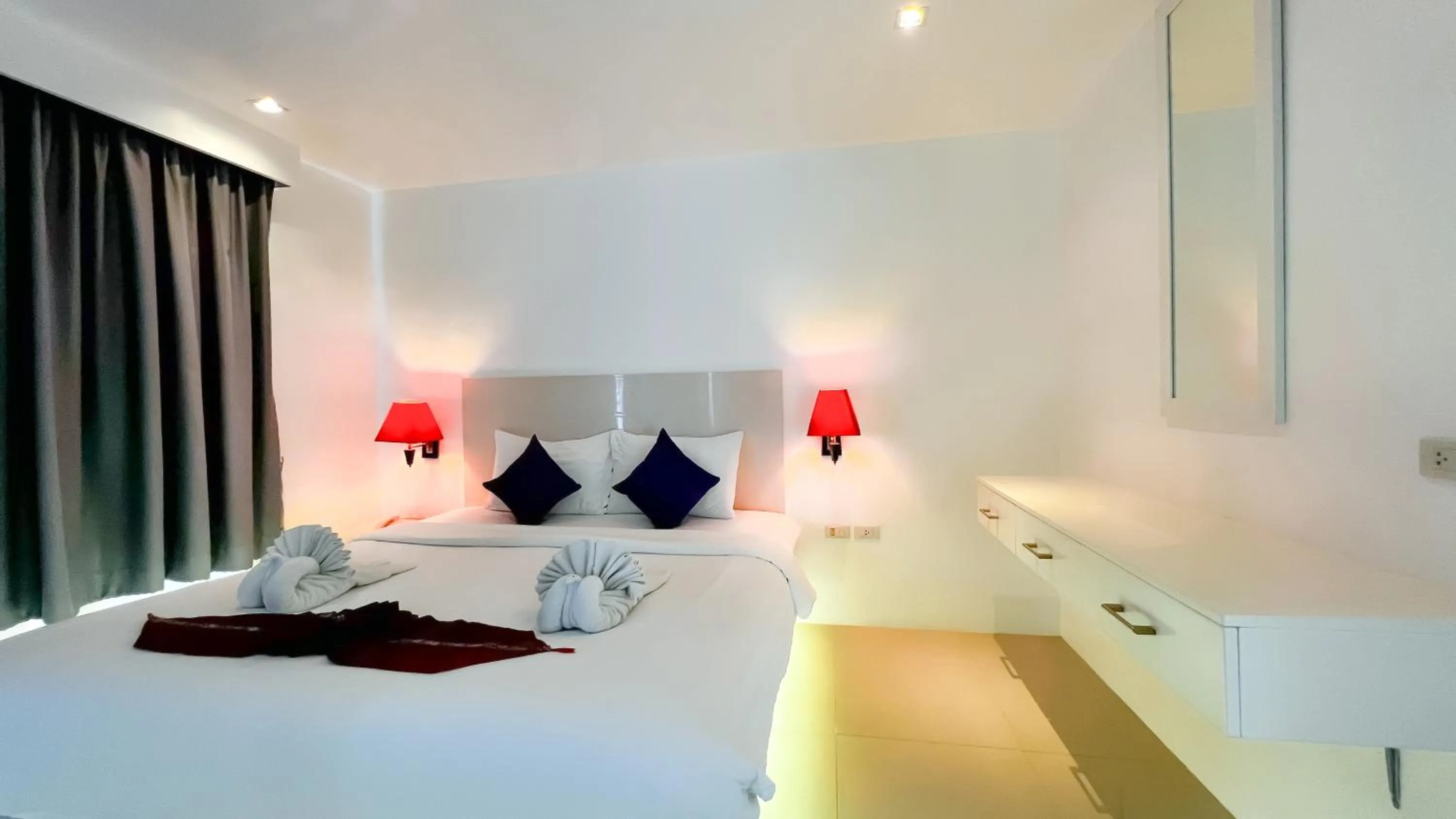 Bed in Grand Sunset Hotel Phuket