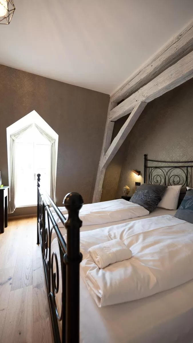 Bed in Boutiquehotel Kloster Pfalzel