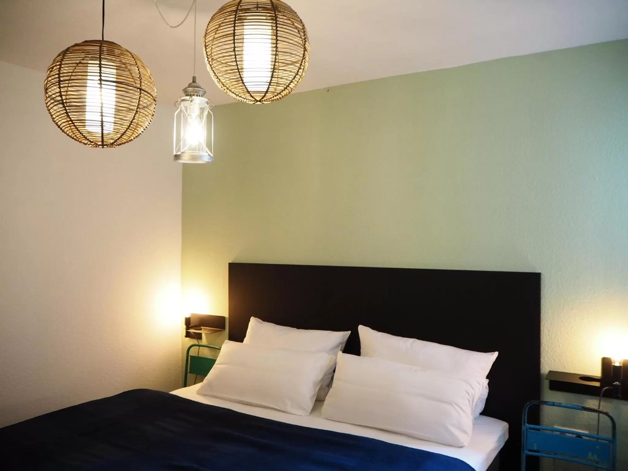 Bed in ONNO Boutique Hotel & Apartments