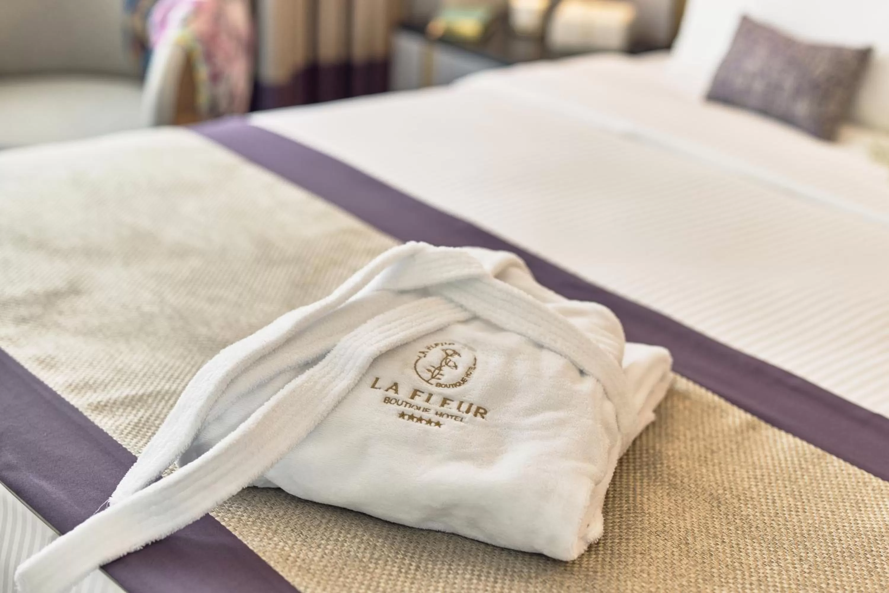 Bed in La Fleur Boutique Hotel