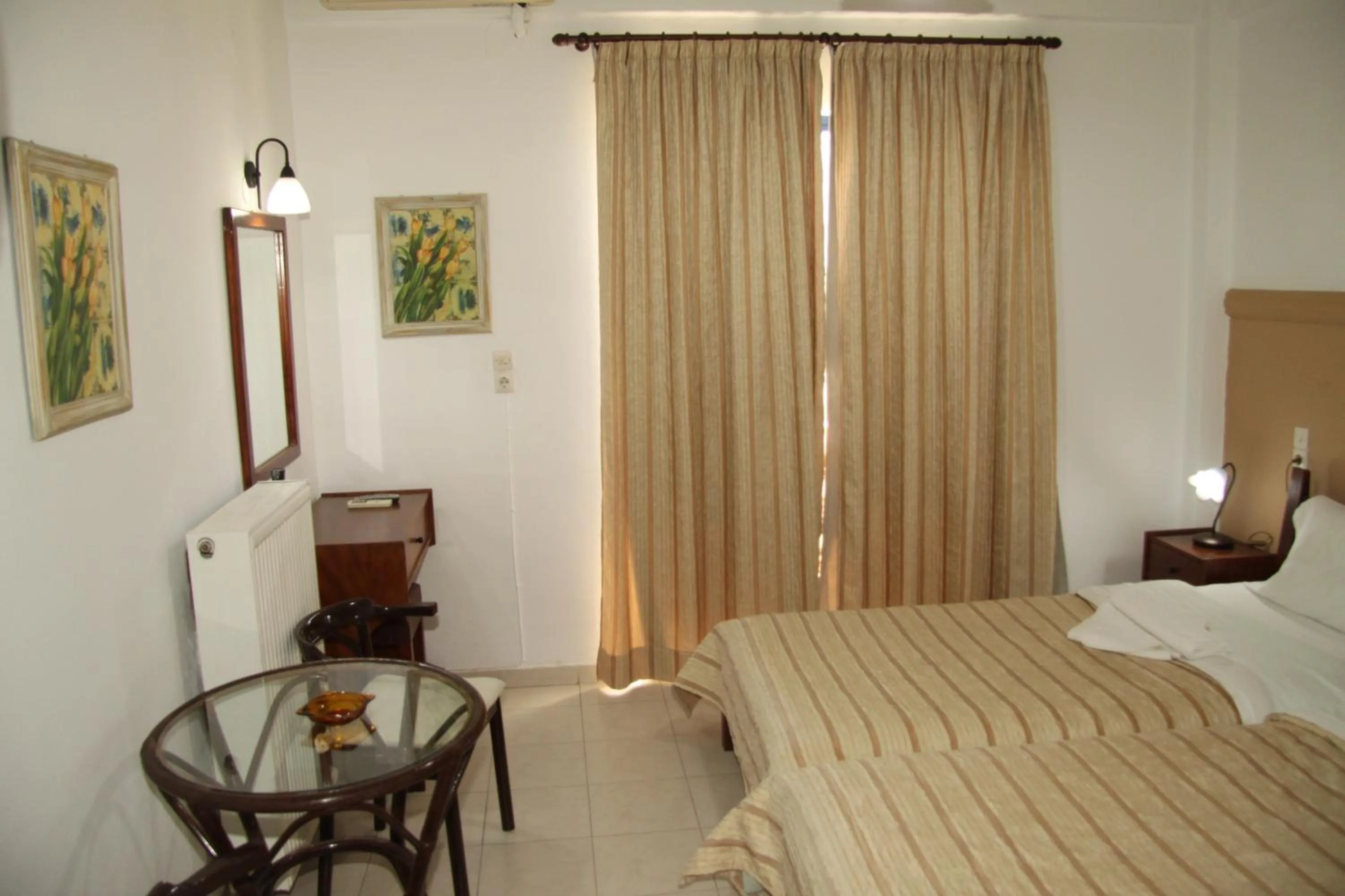 Bedroom, Bed in Danaos Hotel