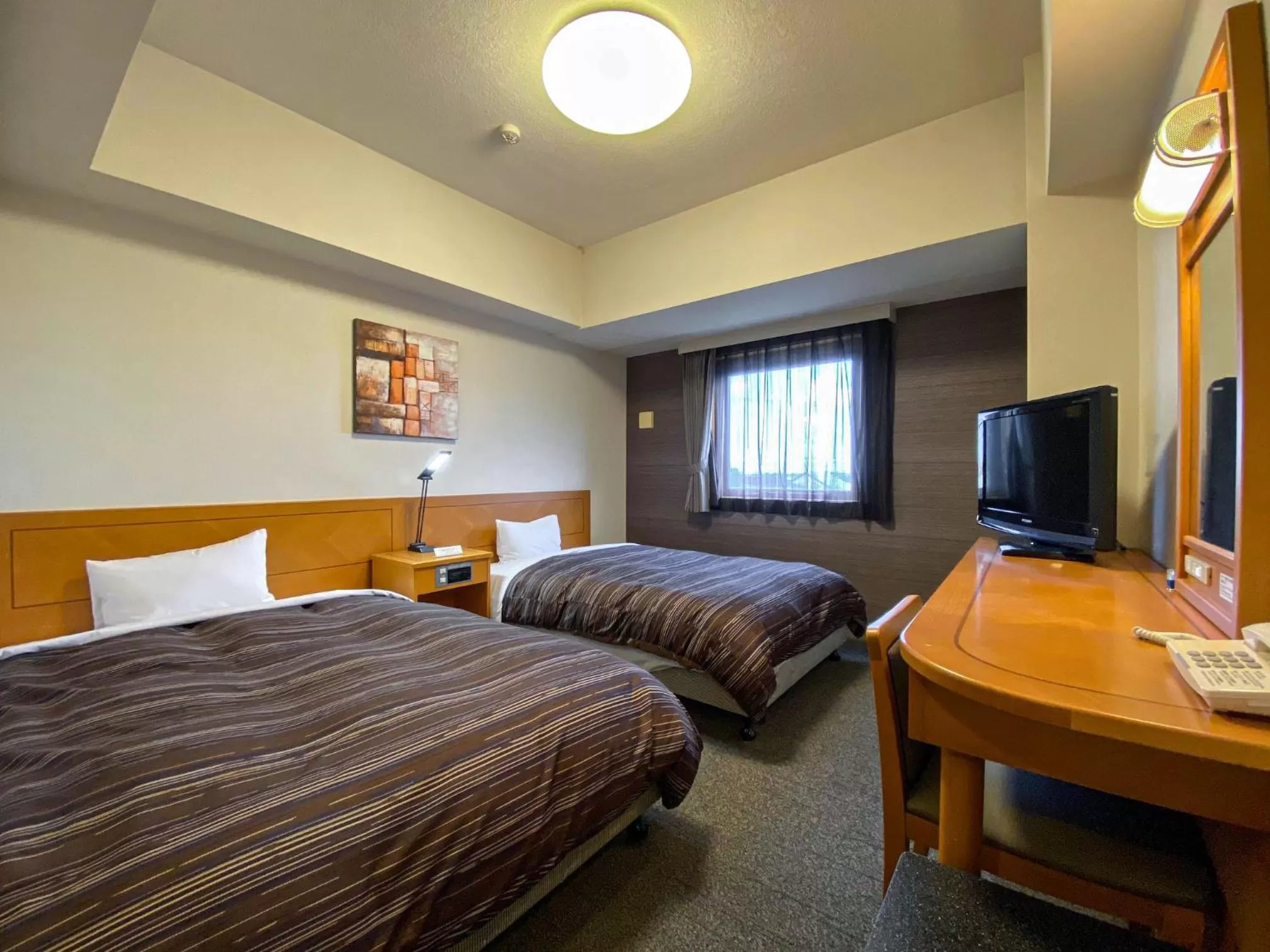 Twin Room - single occupancy - Smoking in Hotel Route-Inn Tsubamesanjo Ekimae