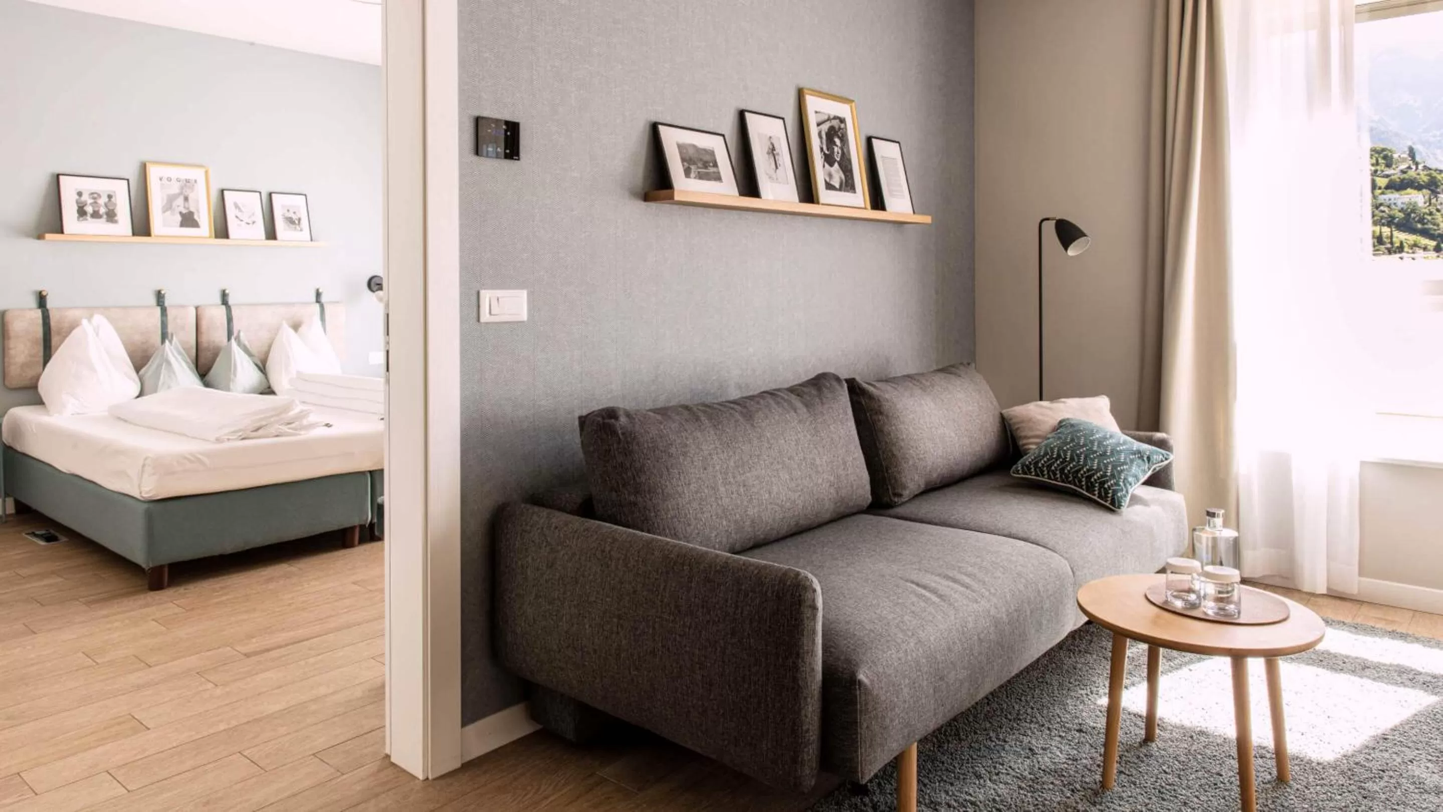 Living room, Bed in City Hotel Merano