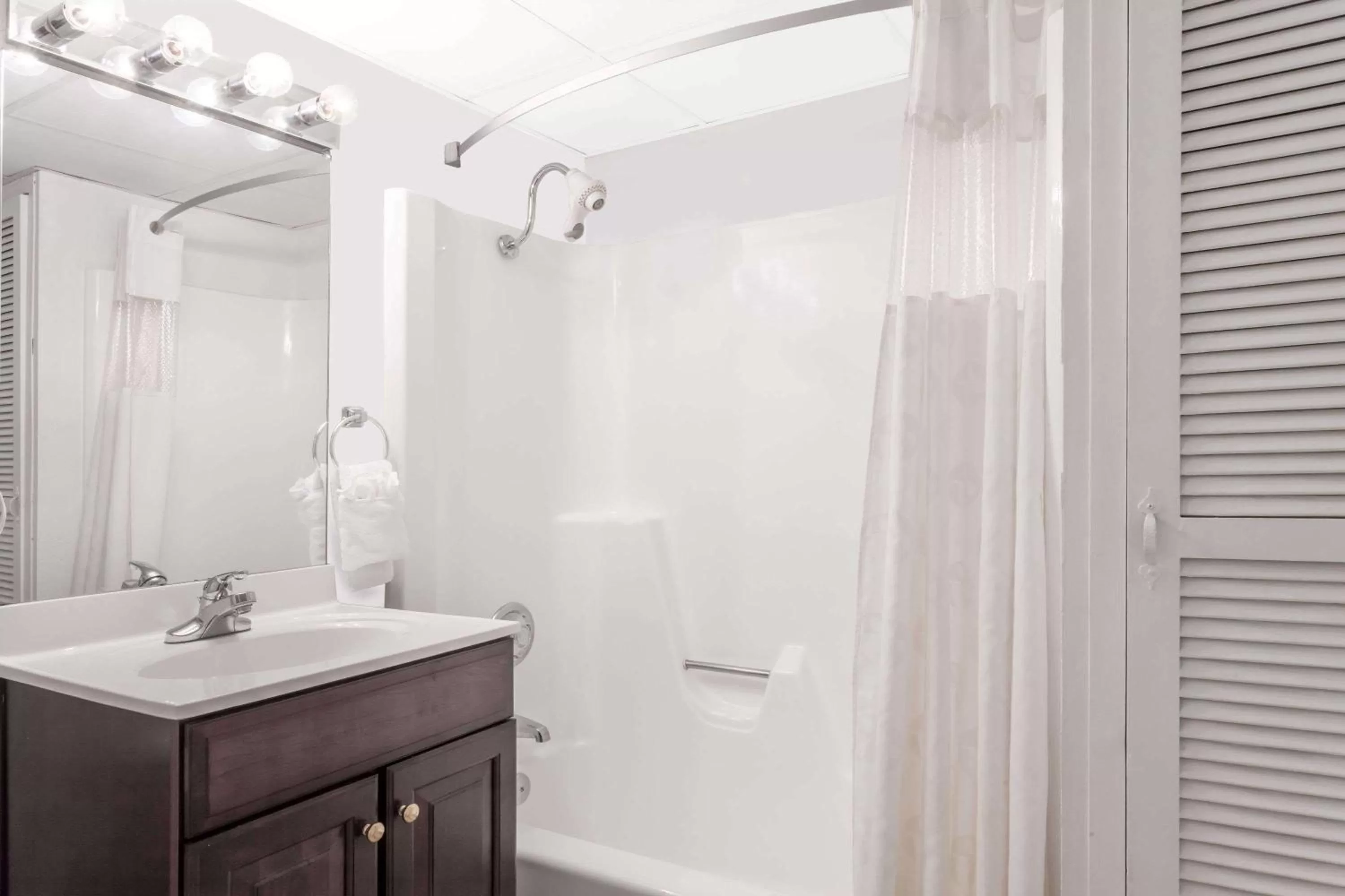 Bathroom in Ramada by Wyndham Henderson/Evansville