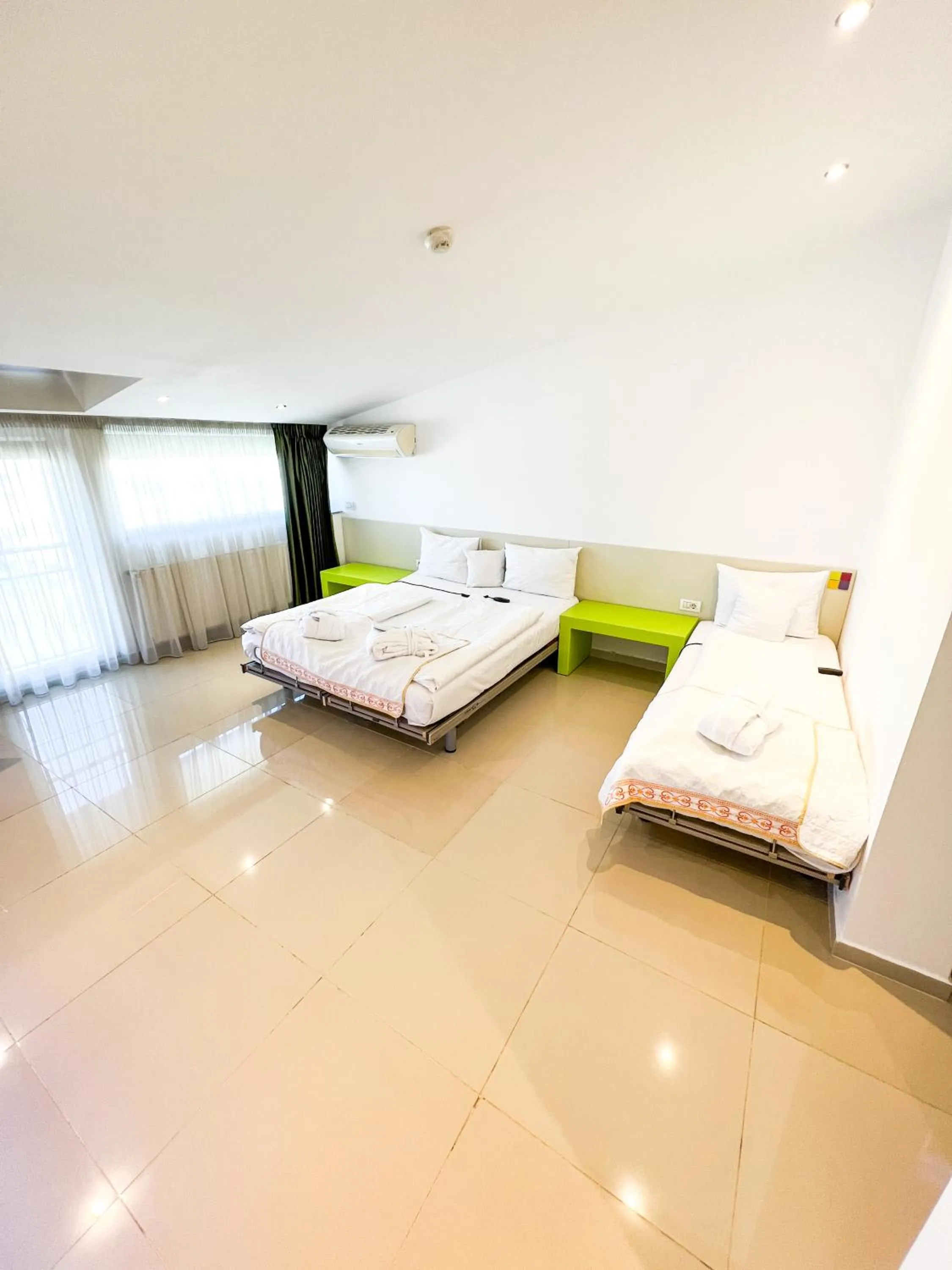 Bed in Christina Hotel