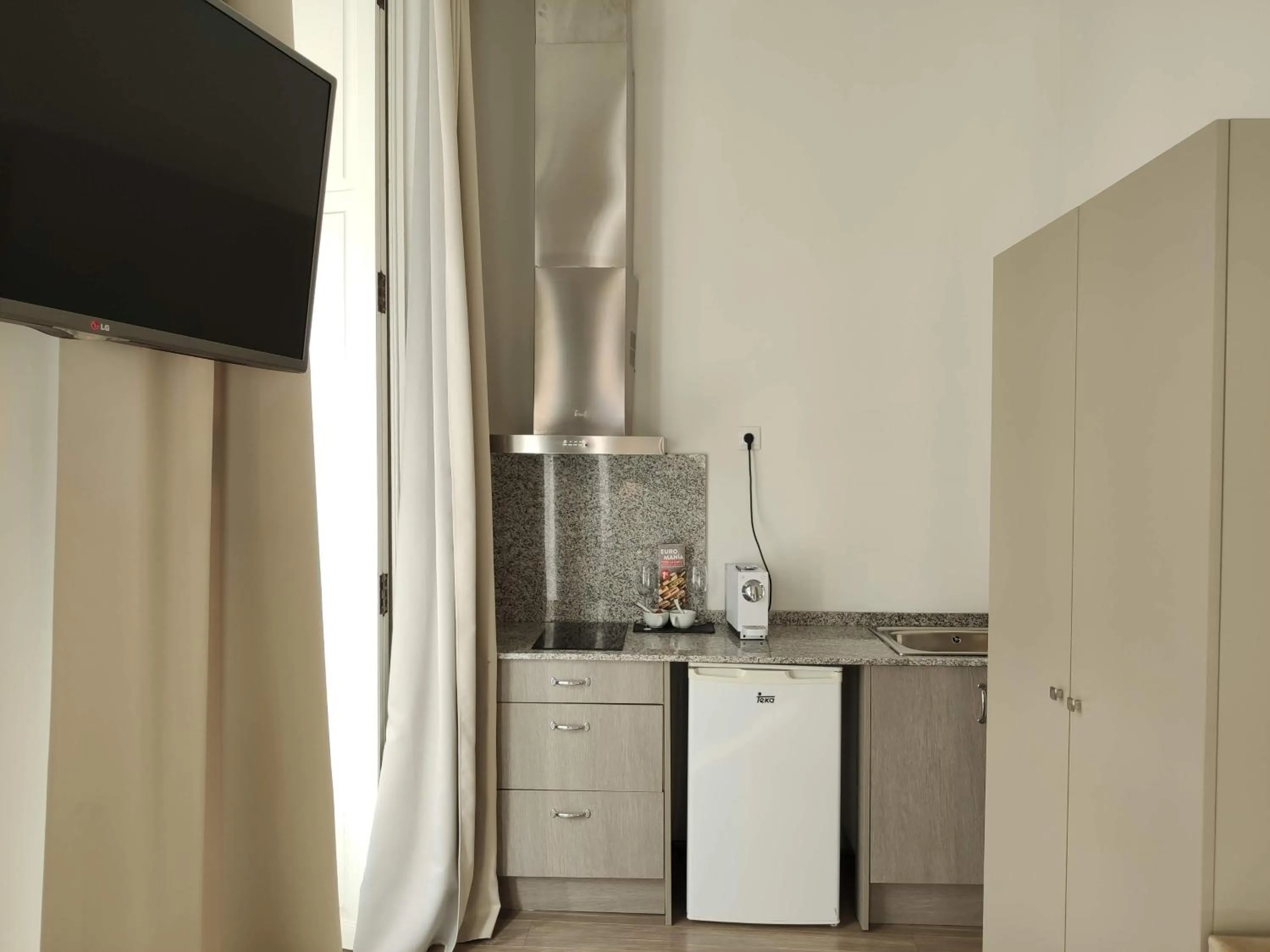 Kitchen or kitchenette in Hotel San Lorenzo Boutique Plaza