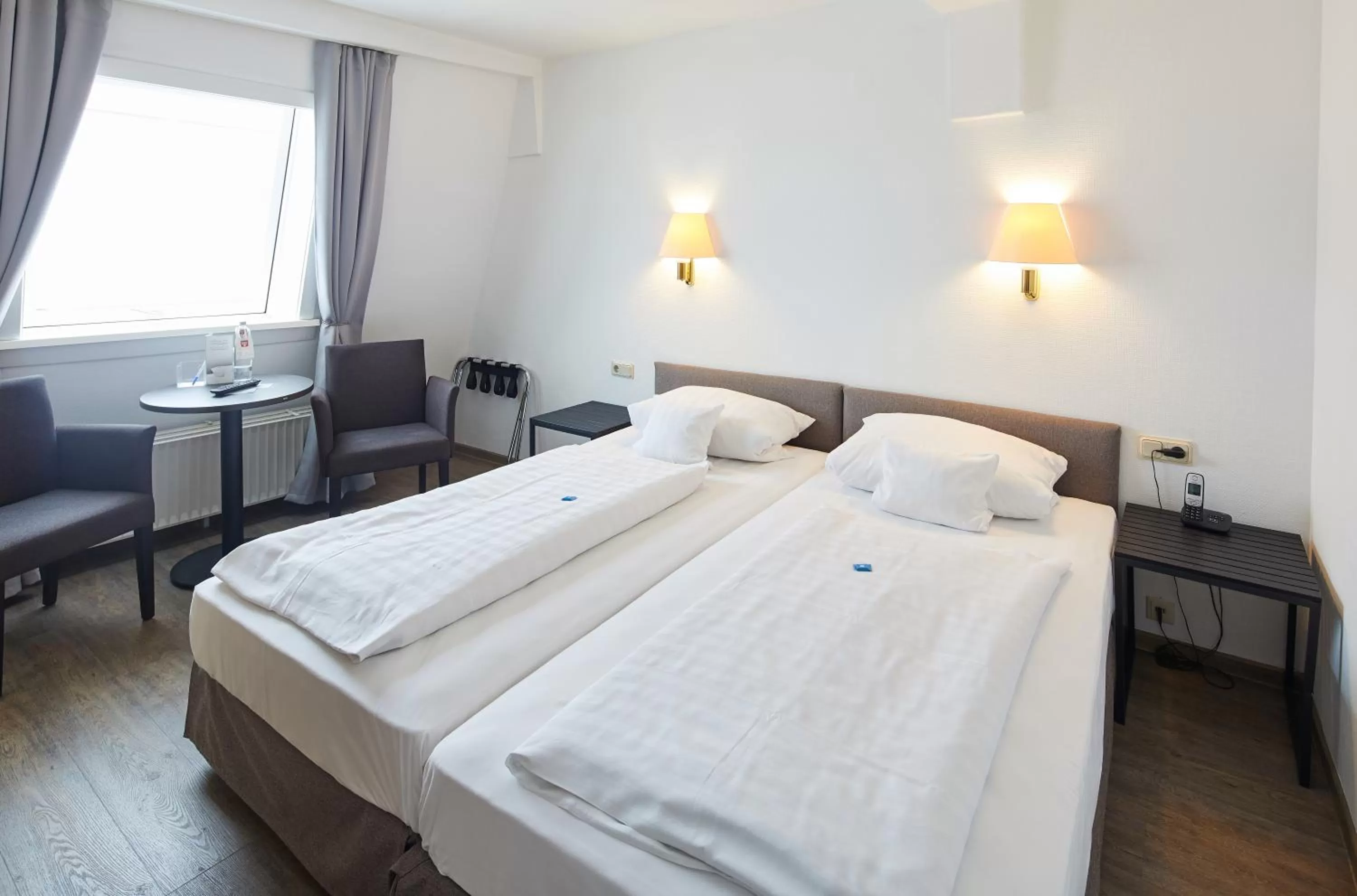 Photo of the whole room, Bed in Hotel Klingelhöffer