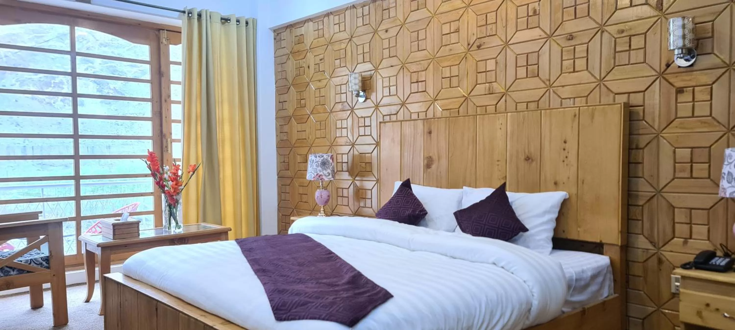 Bed in Indus Lodges Gilgit