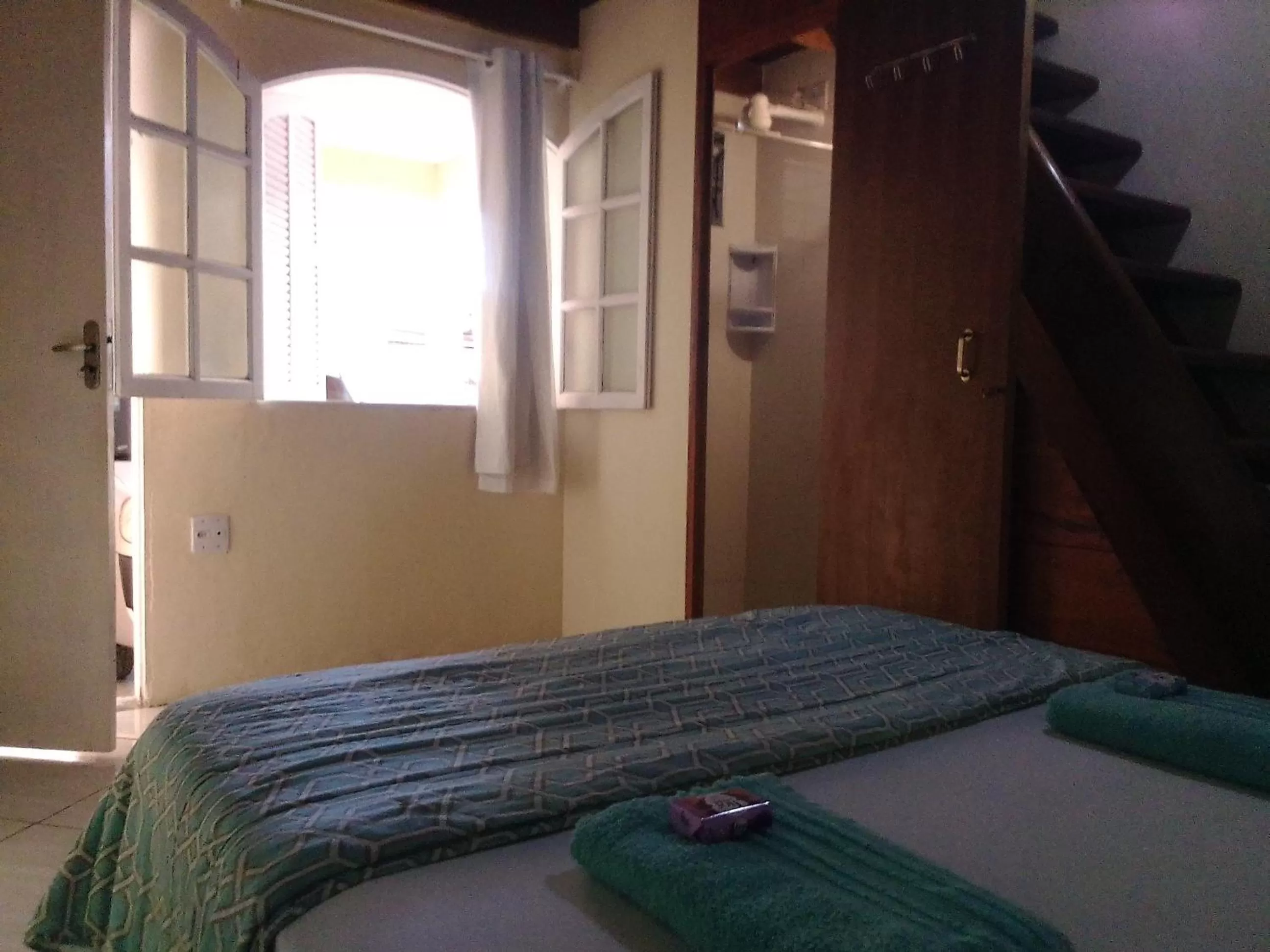 Bed in Hospedagem Pousada Fantasia Paraty