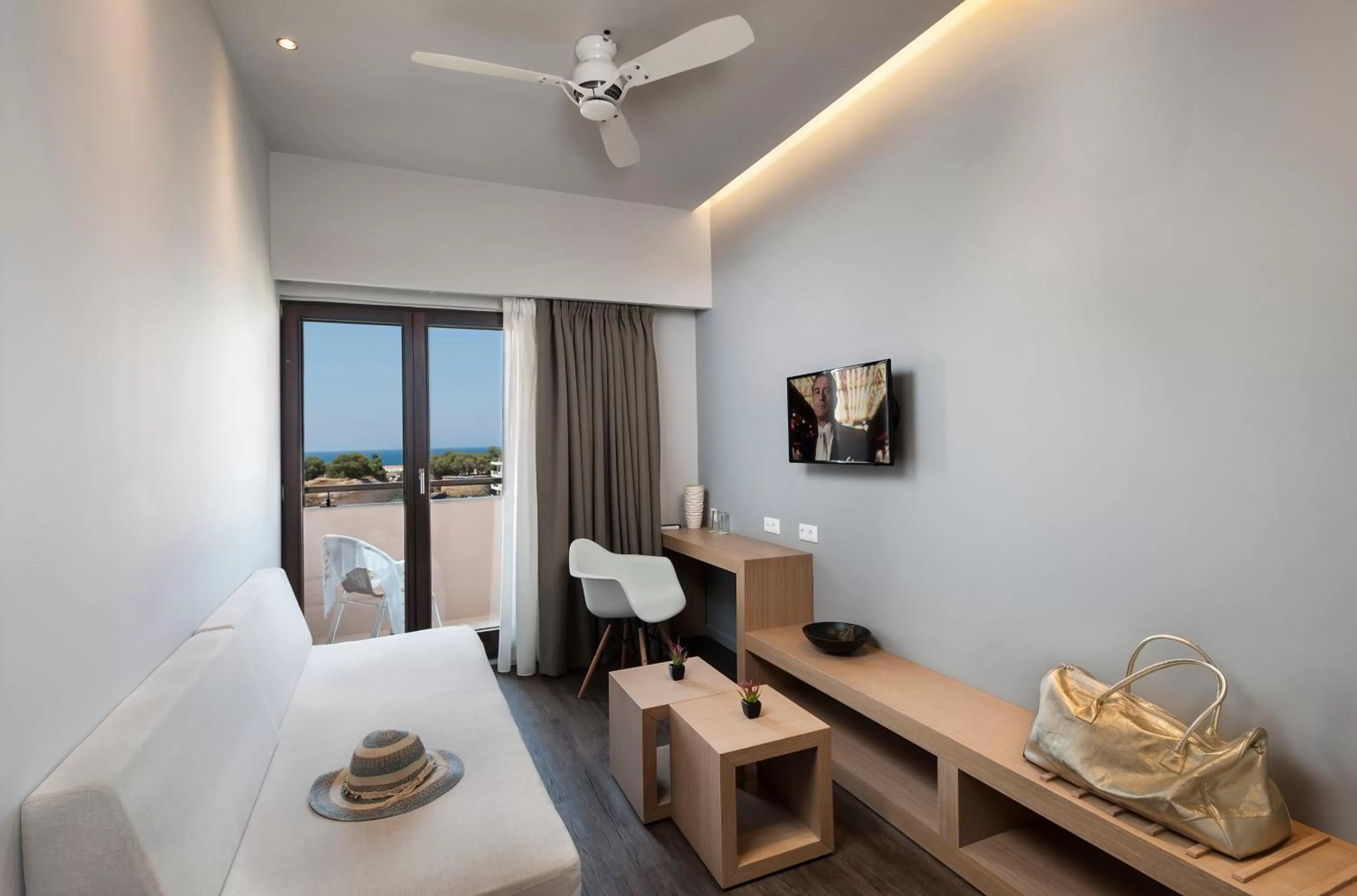 Seating area, Bed in Kriti Hotel