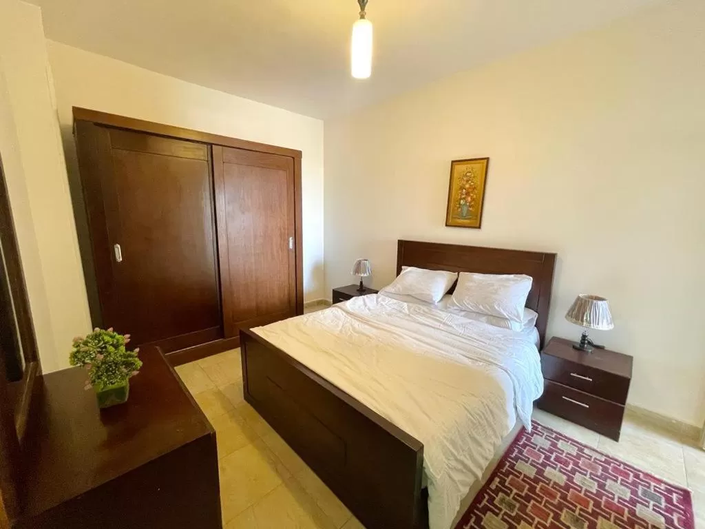 Bed in Charbel apartments