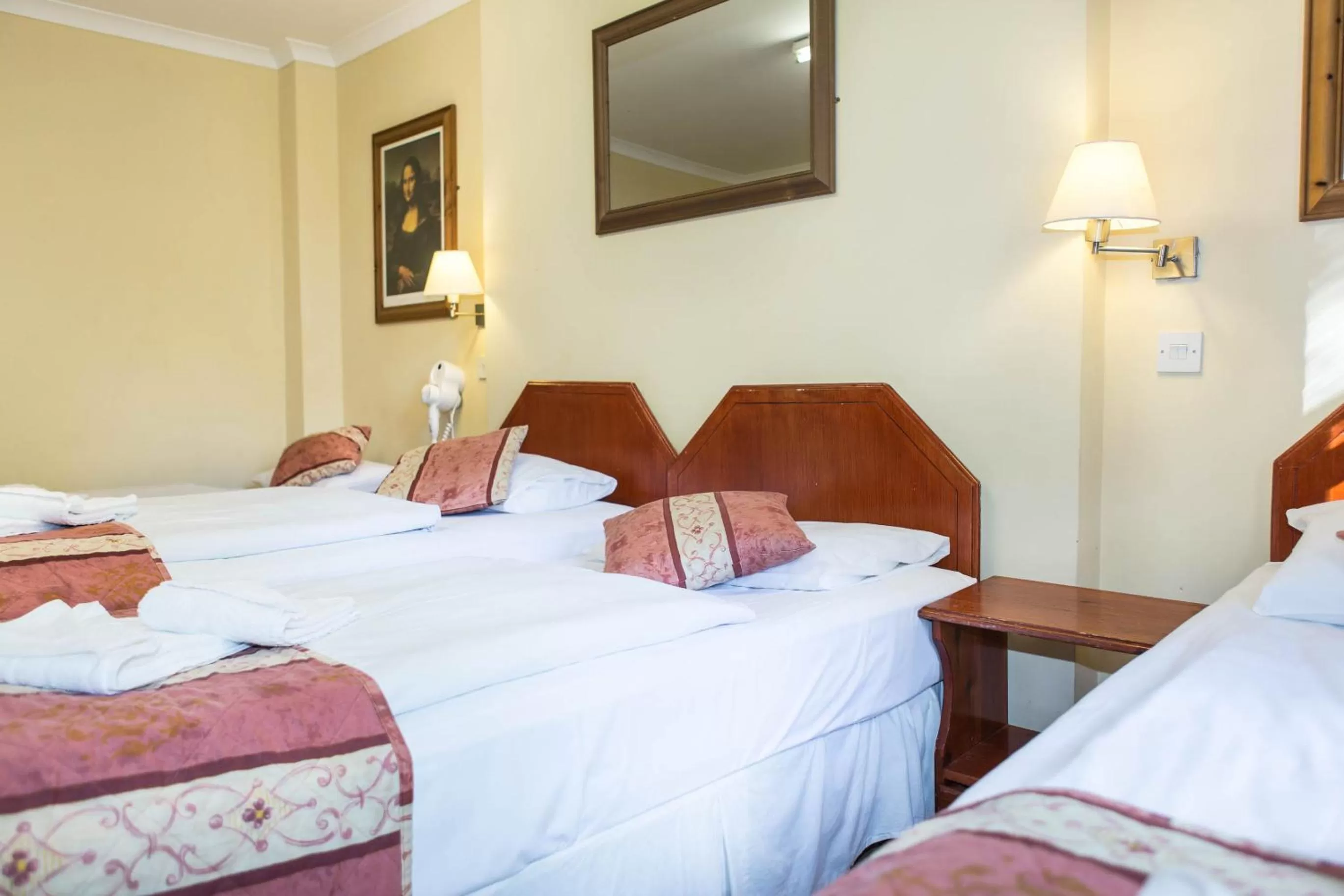 Bed in Dolphin Hotel