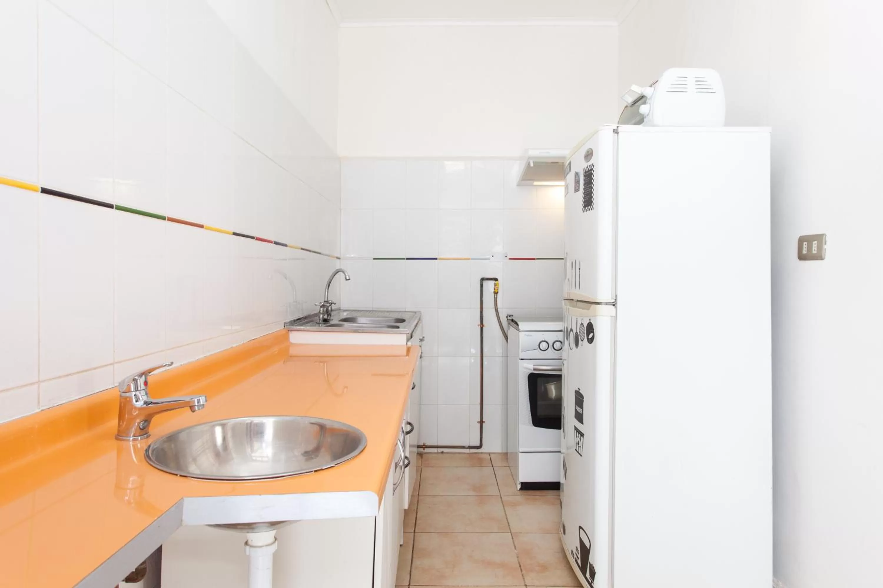 Kitchen or kitchenette in ITALIA SUITE B&B habitaciones con baño privado y aire acondicionado