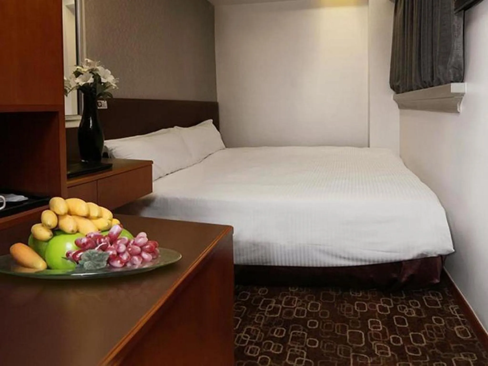 Photo of the whole room in Lander Hotel Prince Edward