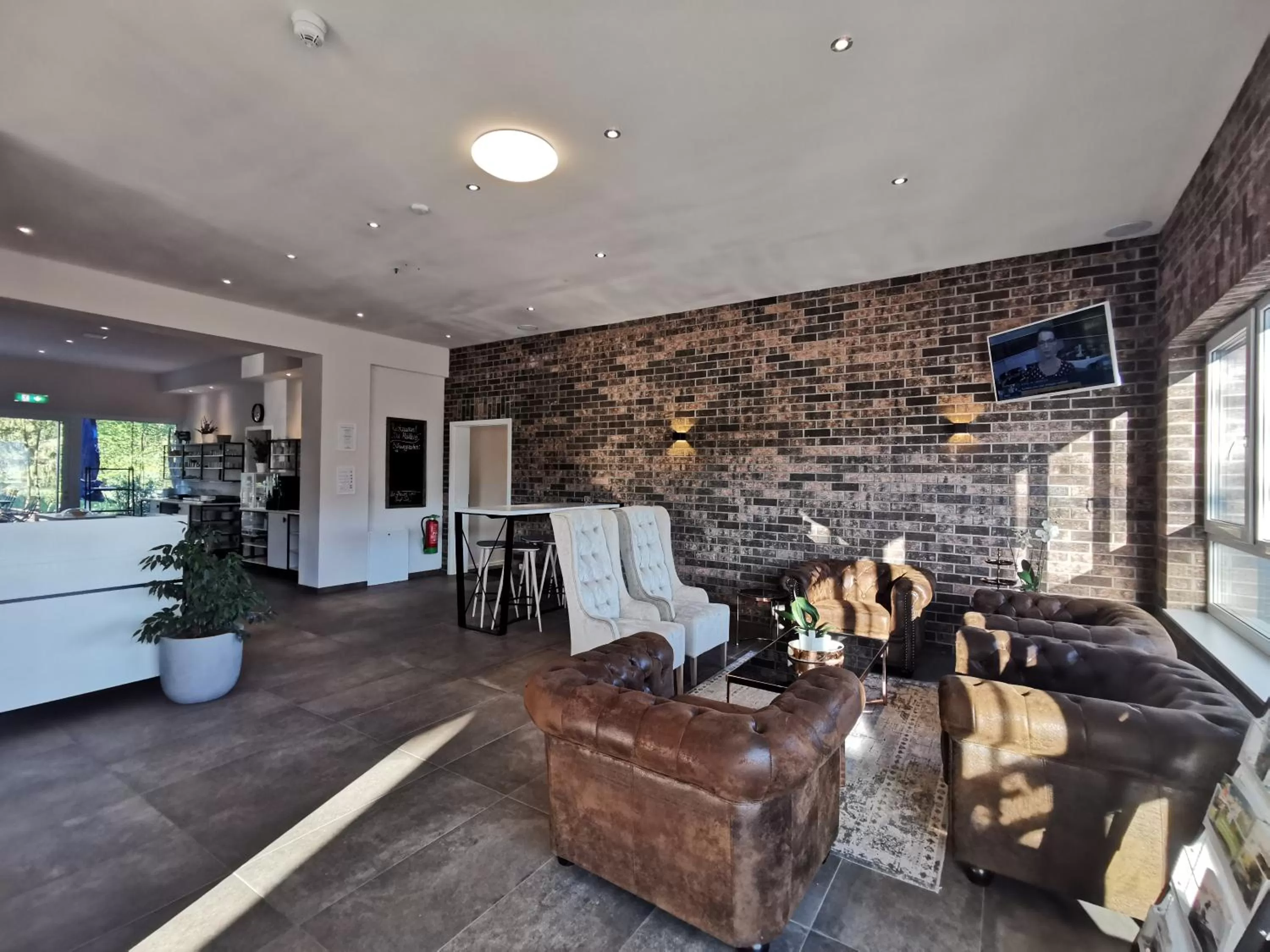 Communal lounge/ TV room in Hotel Gutsmühle