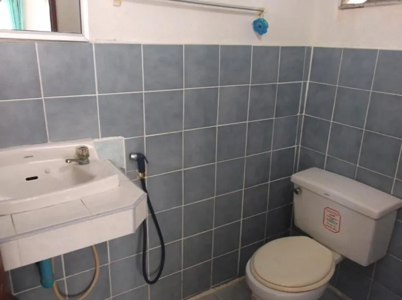 Toilet in Palm Point Village