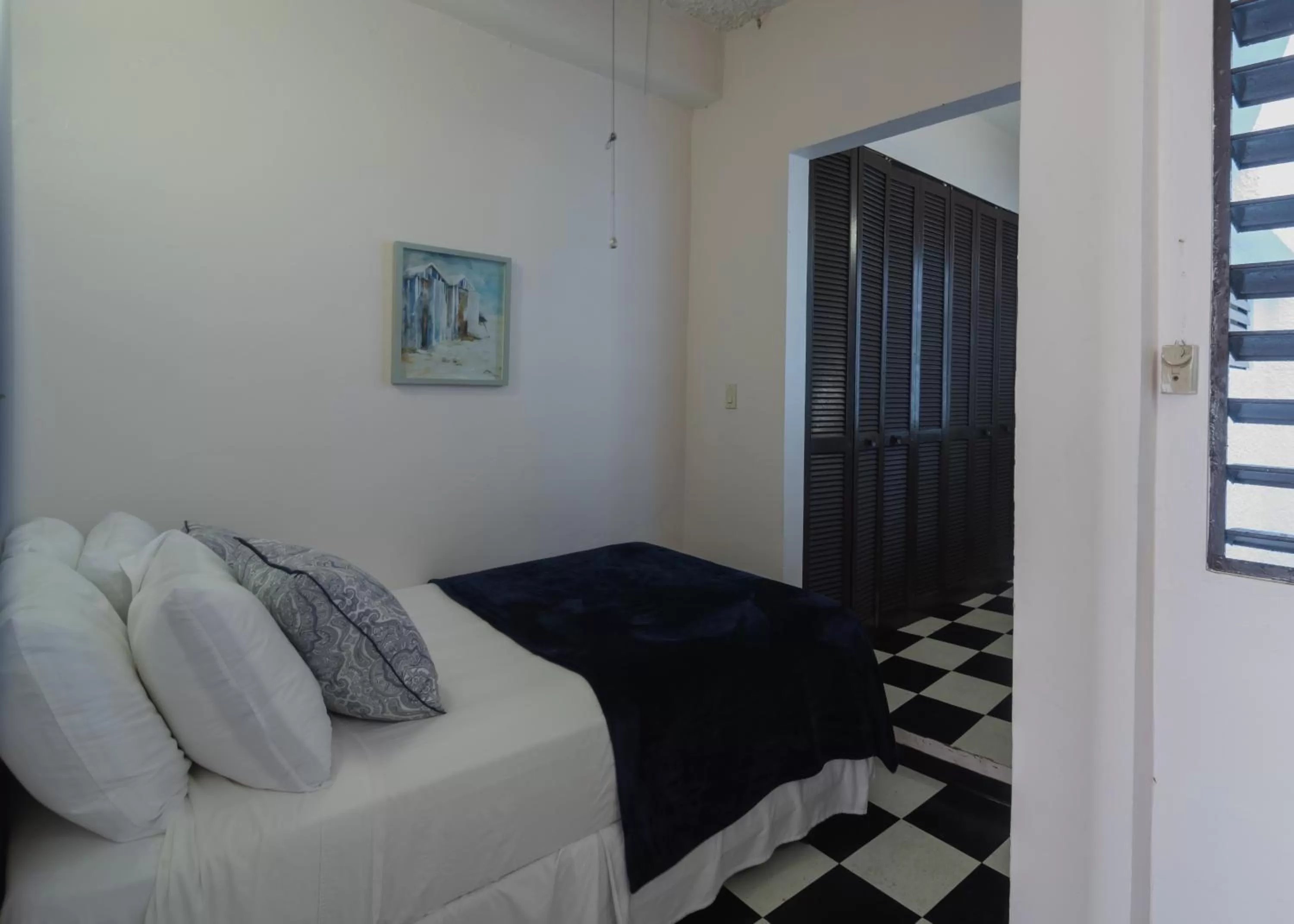 Photo of the whole room, Bed in La Capitana Old San Juan Building