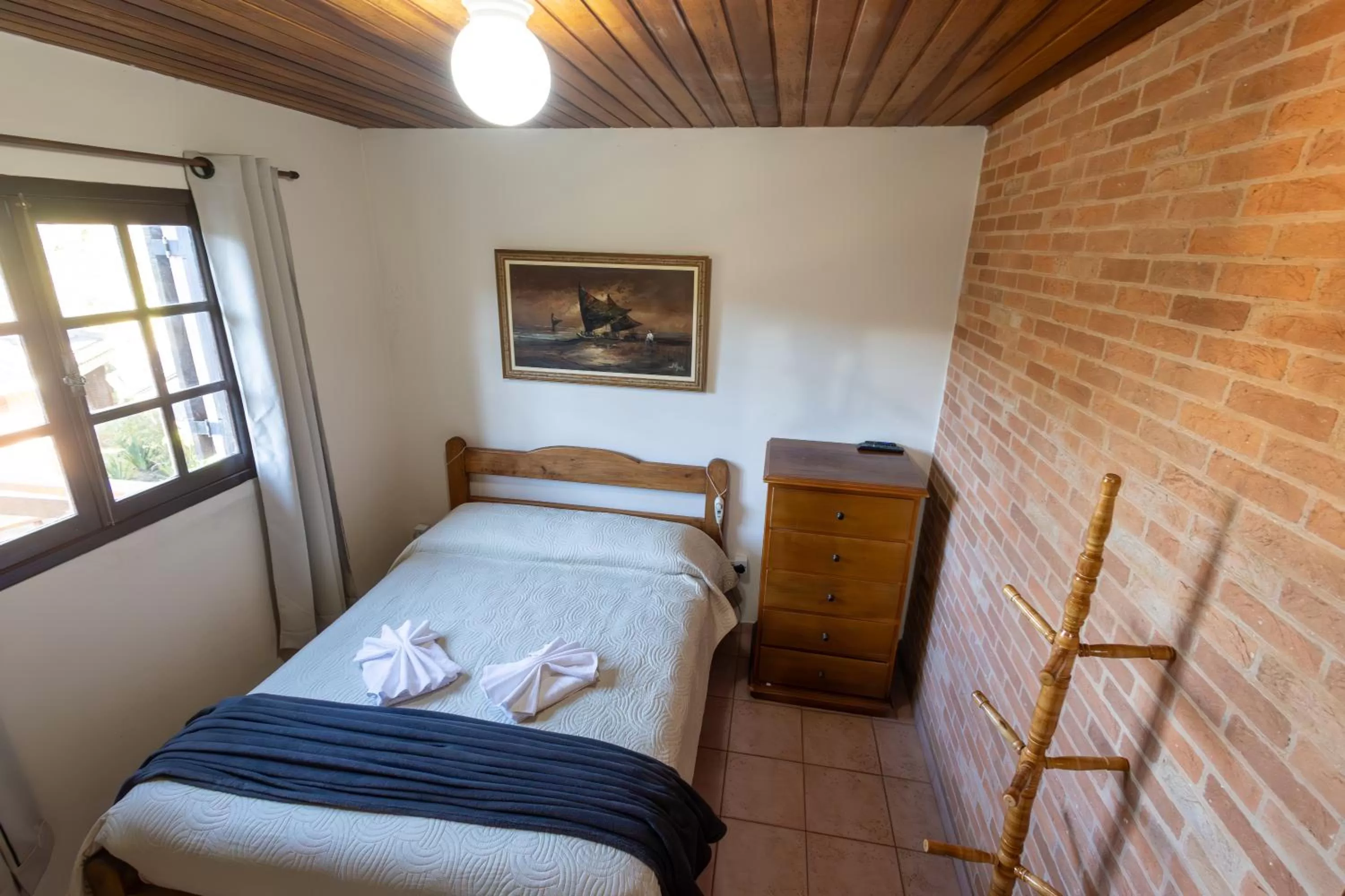 Bed in Pousada 3 Pinheiros