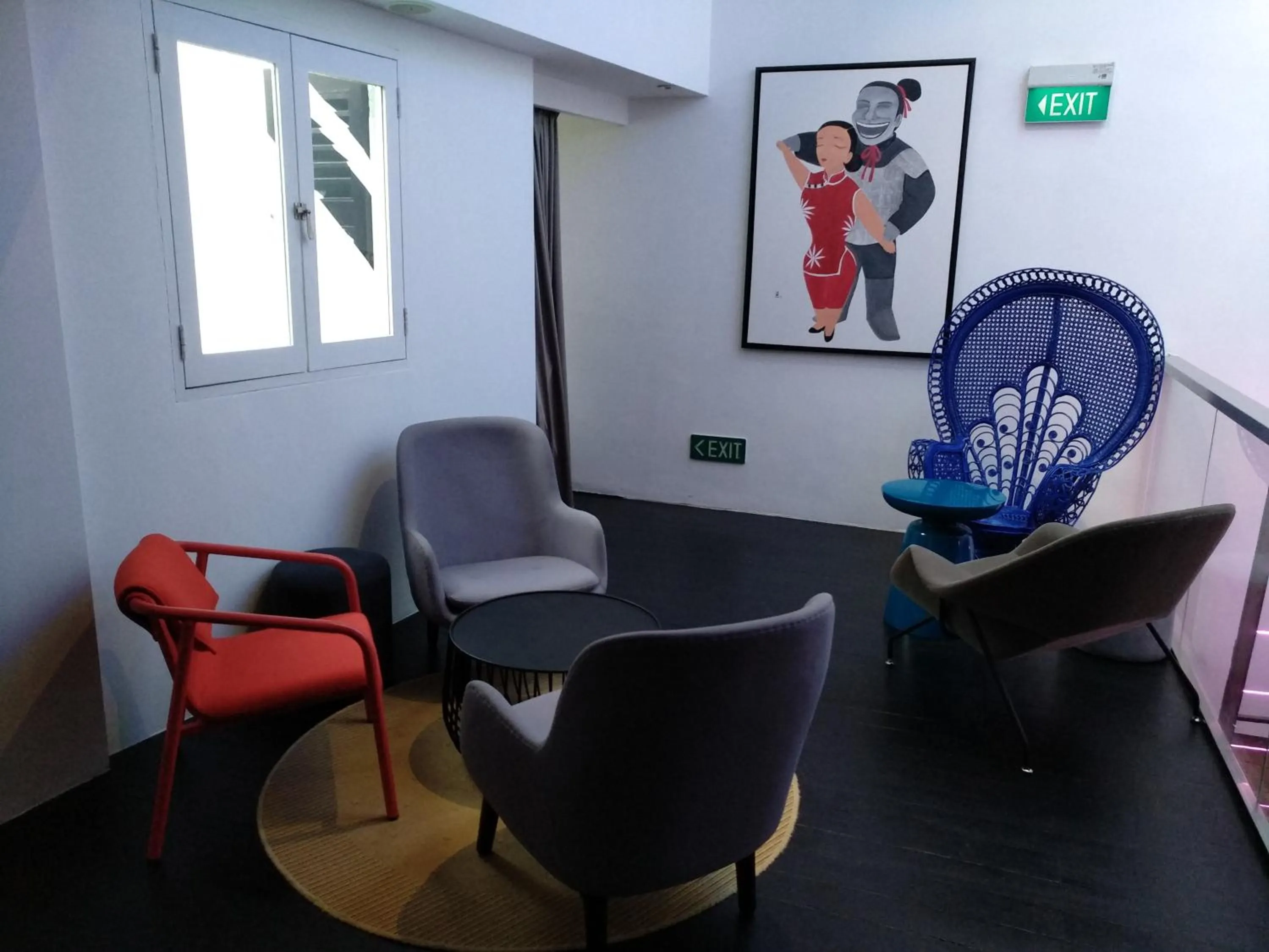 Communal lounge/ TV room, Seating Area in Hi Hotel