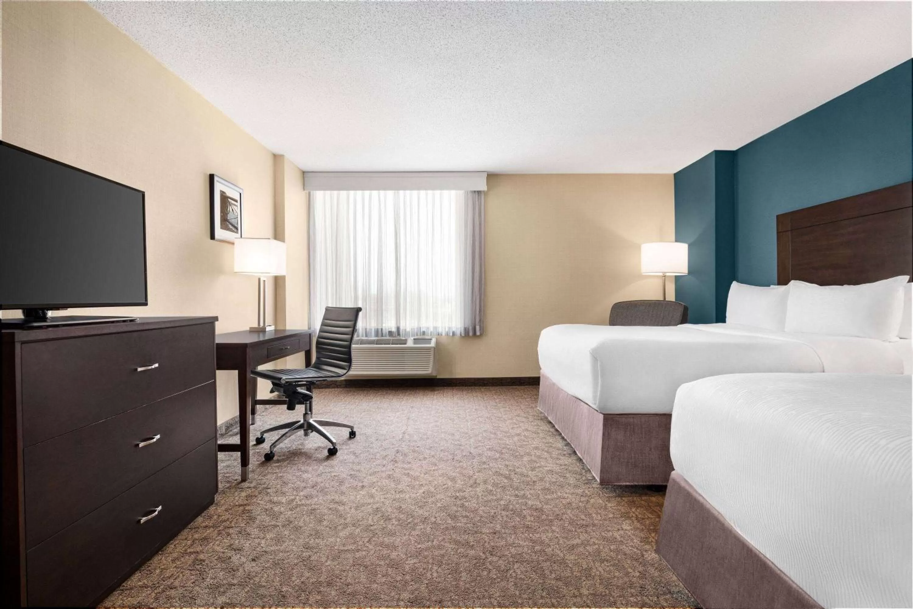 Photo of the whole room, Bed in Wyndham Garden Niagara Falls Fallsview