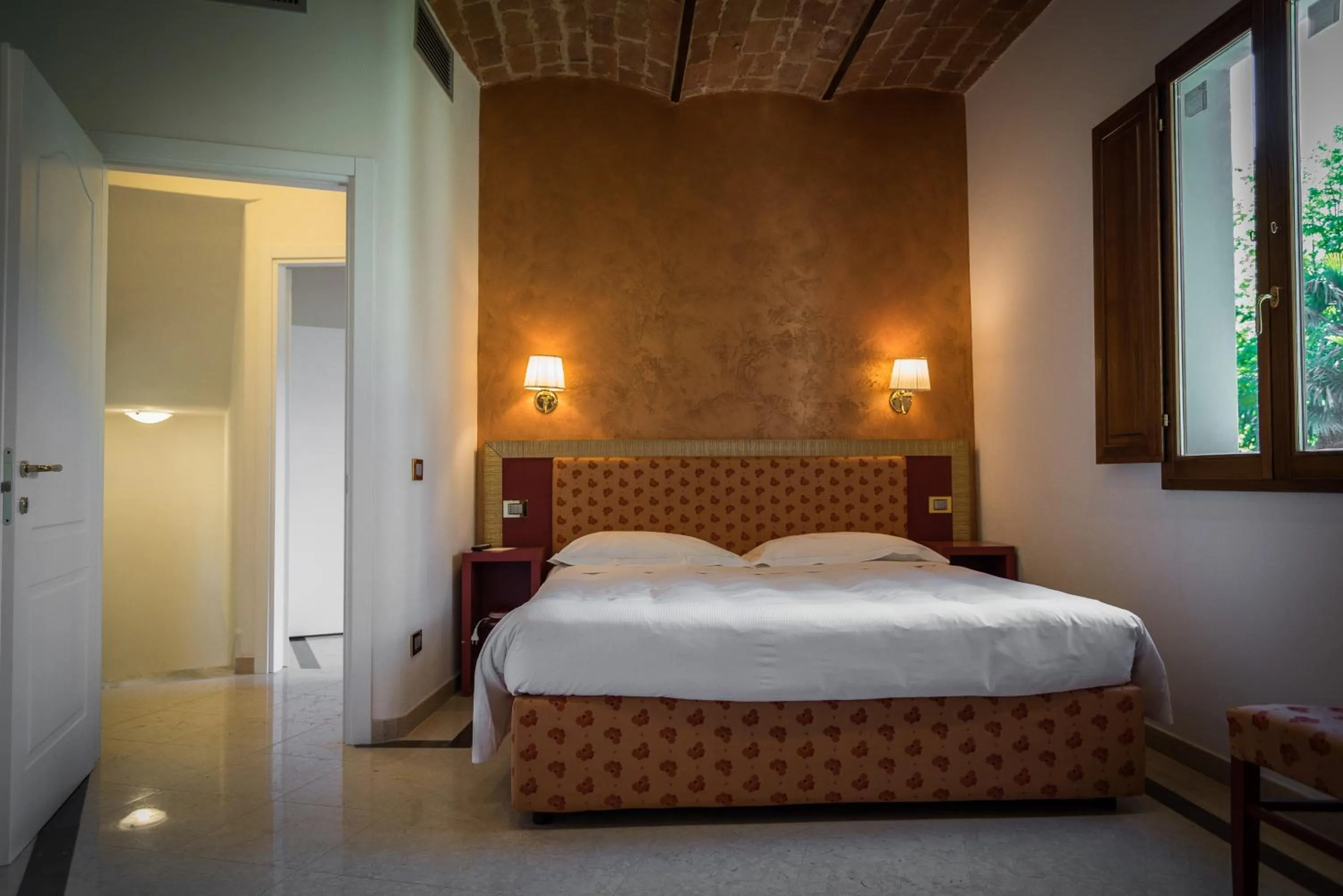 Bed in Relais La Corte di Cloris