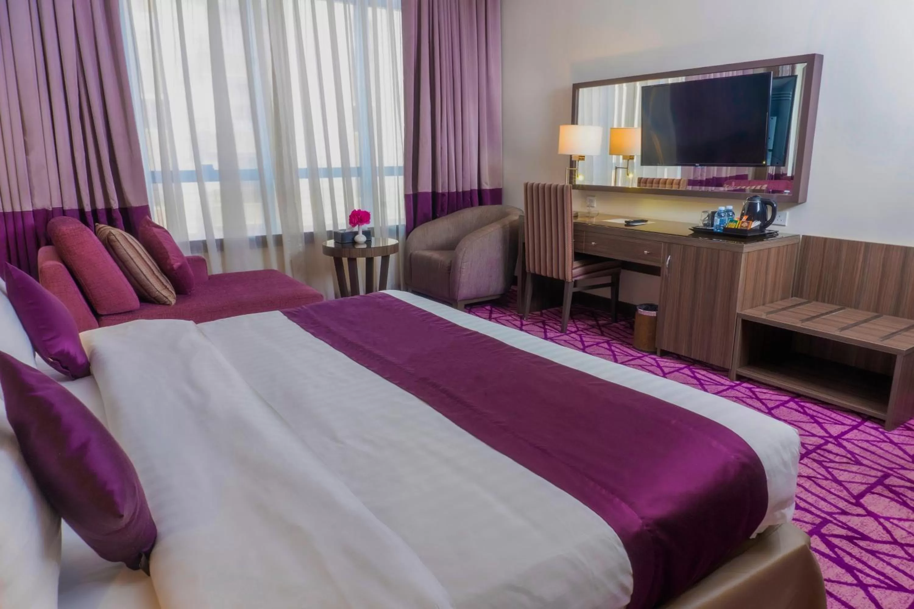 Photo of the whole room in Aquila Al Hamra Hotel