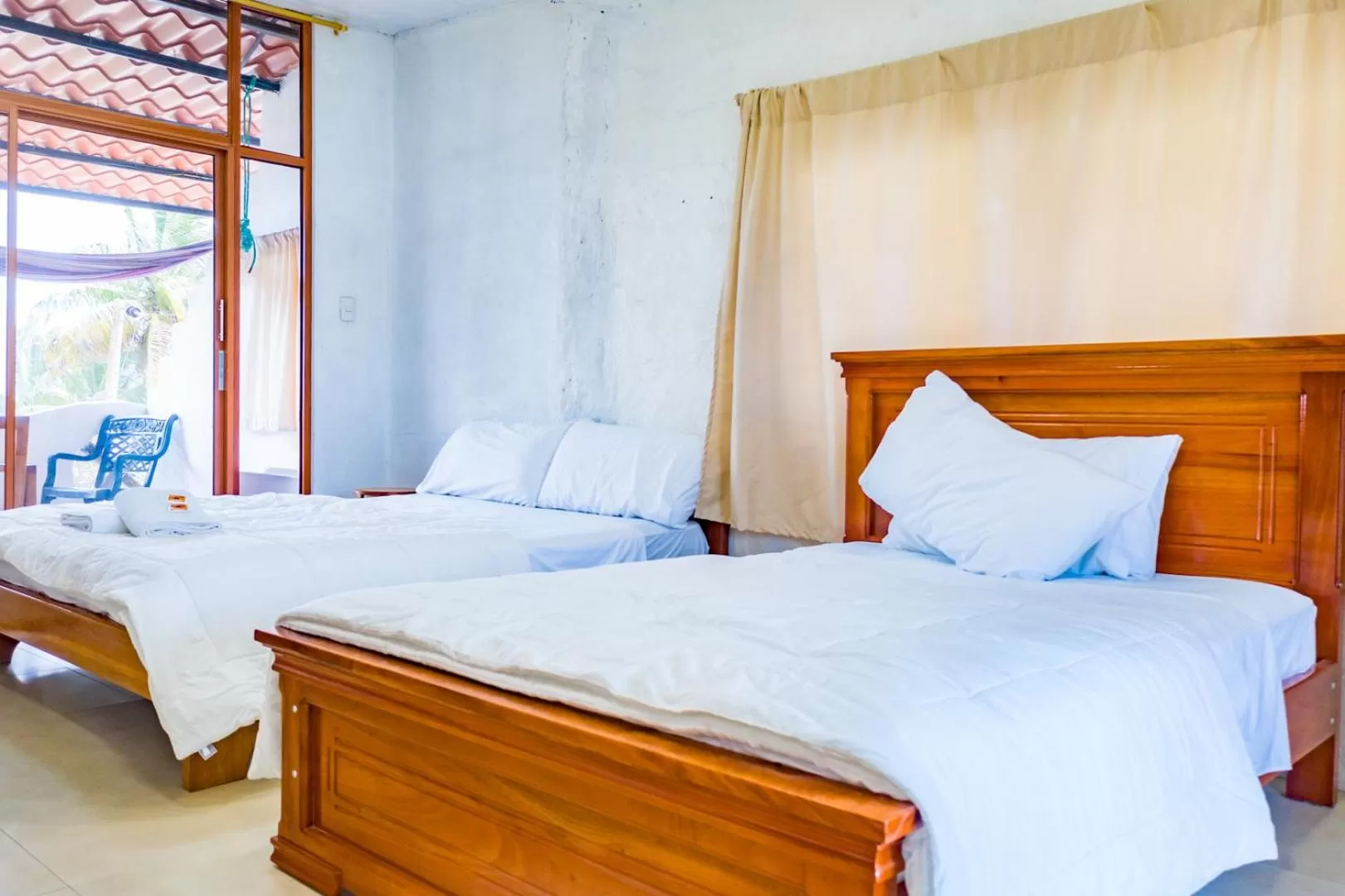 Bed in Royal Galápagos Inn