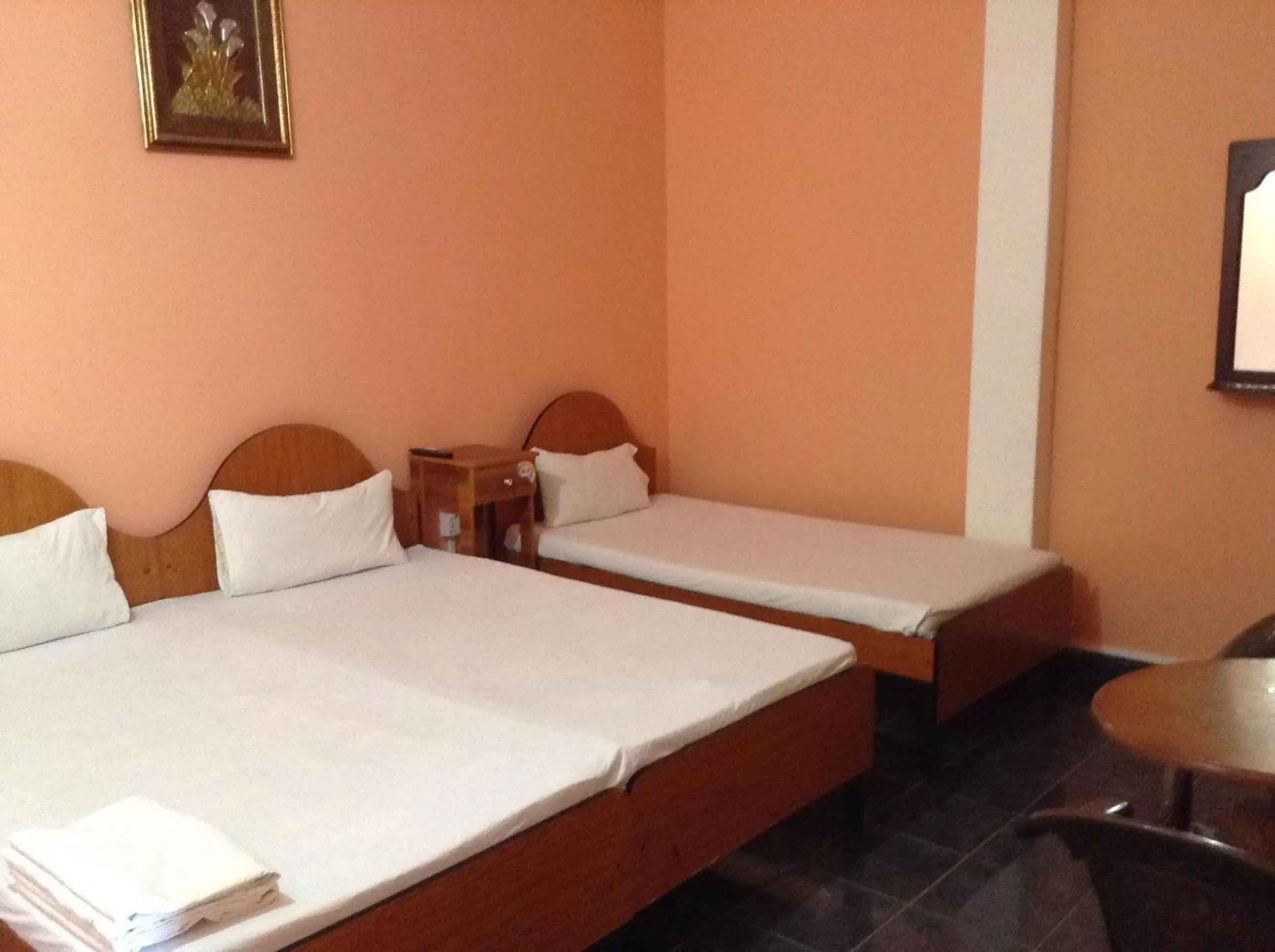 Bed in Sunshine Hotel