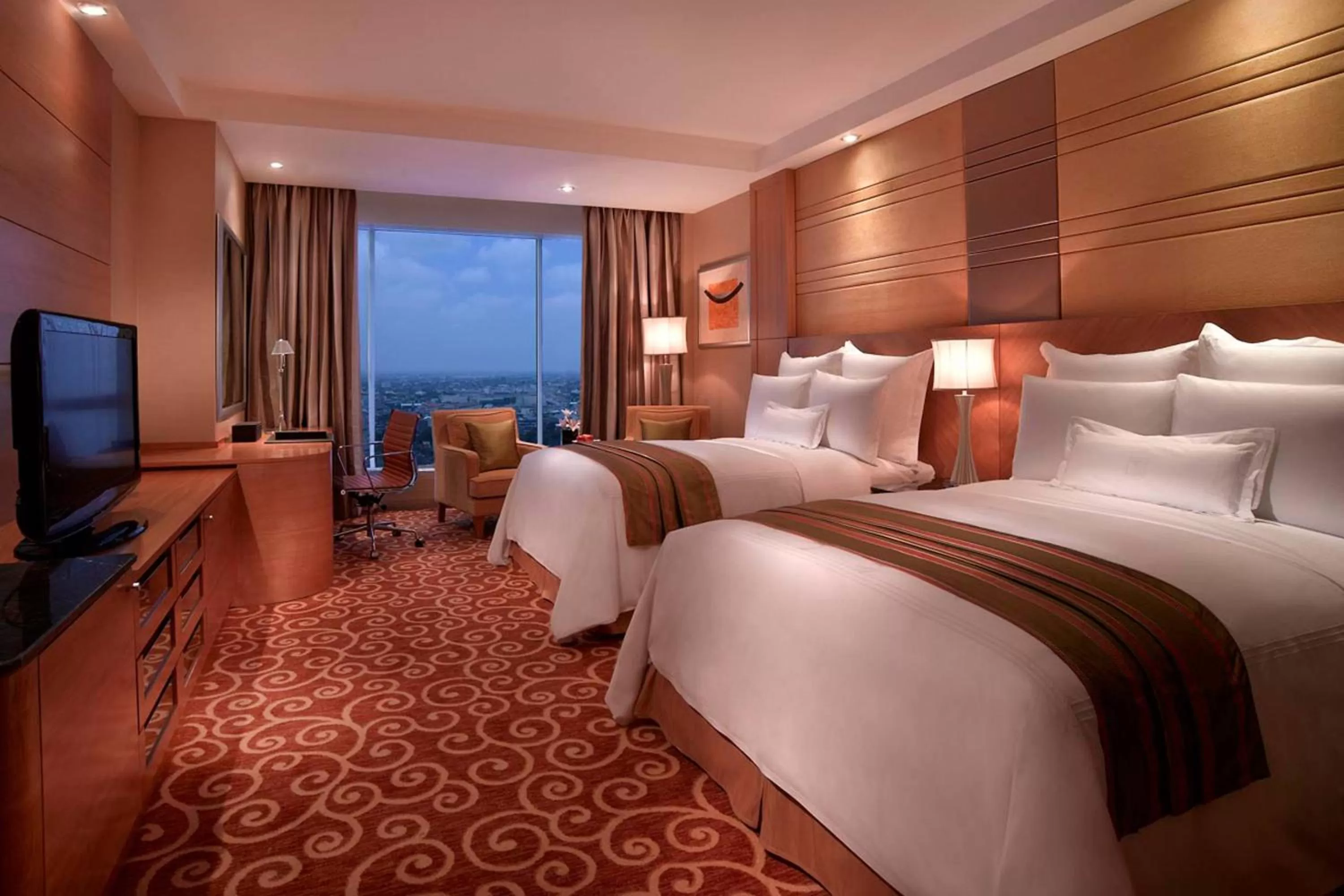 Photo of the whole room, Bed in JW Marriott Hotel Medan