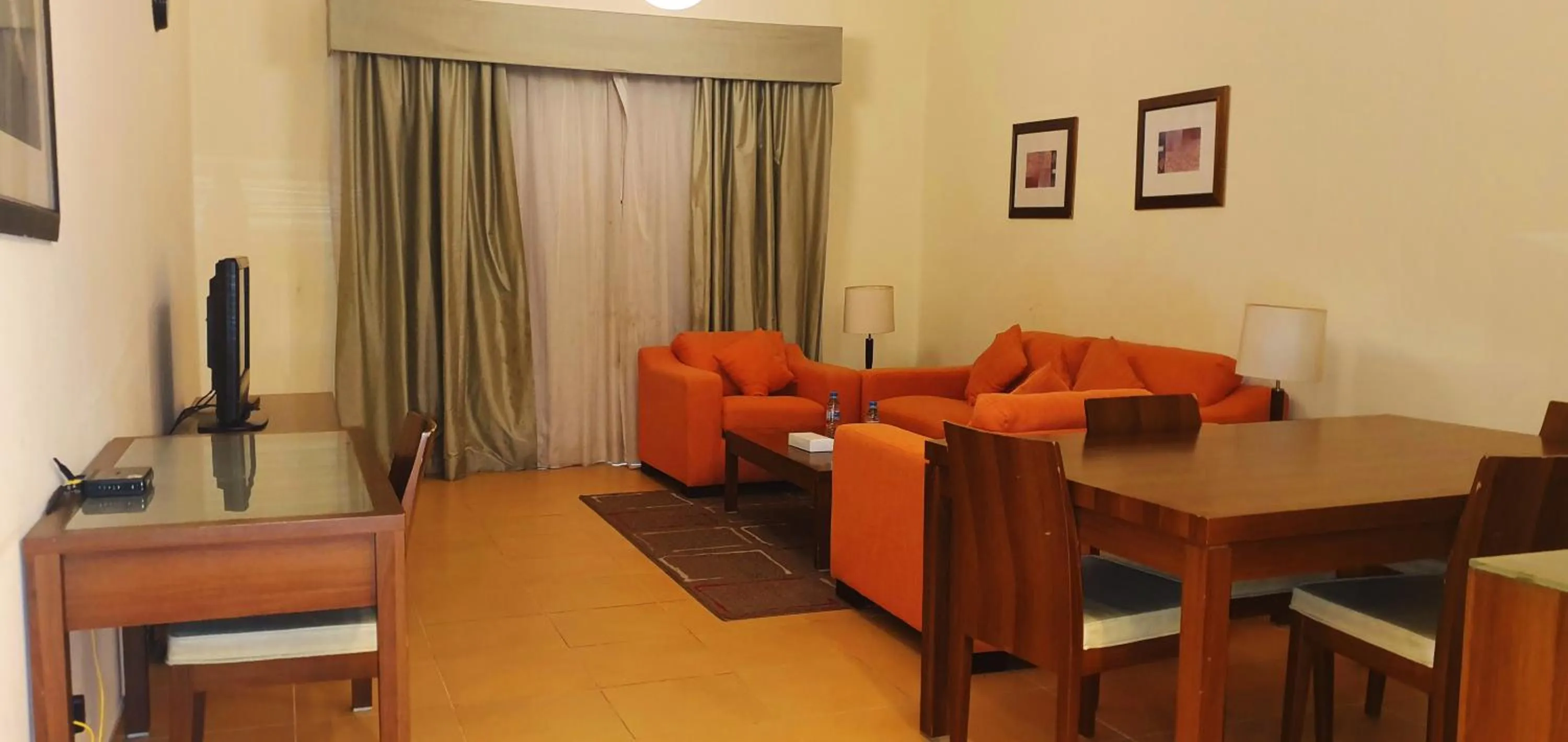 Communal lounge/ TV room in Tulip Hotel Apartments