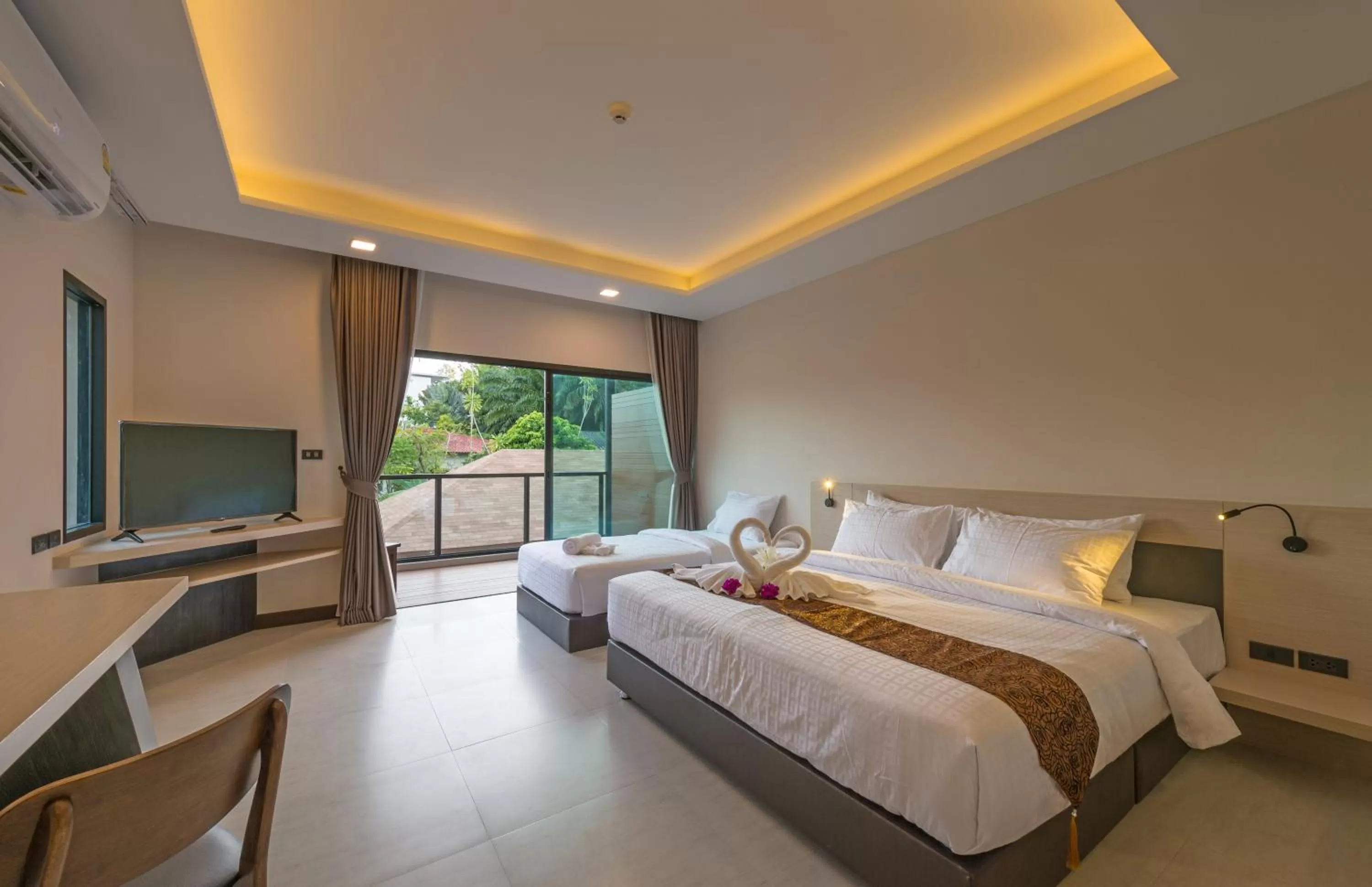 Communal lounge/ TV room, Bed in Cher​mantra​ Aonang​ Resort & Pool​ Suite