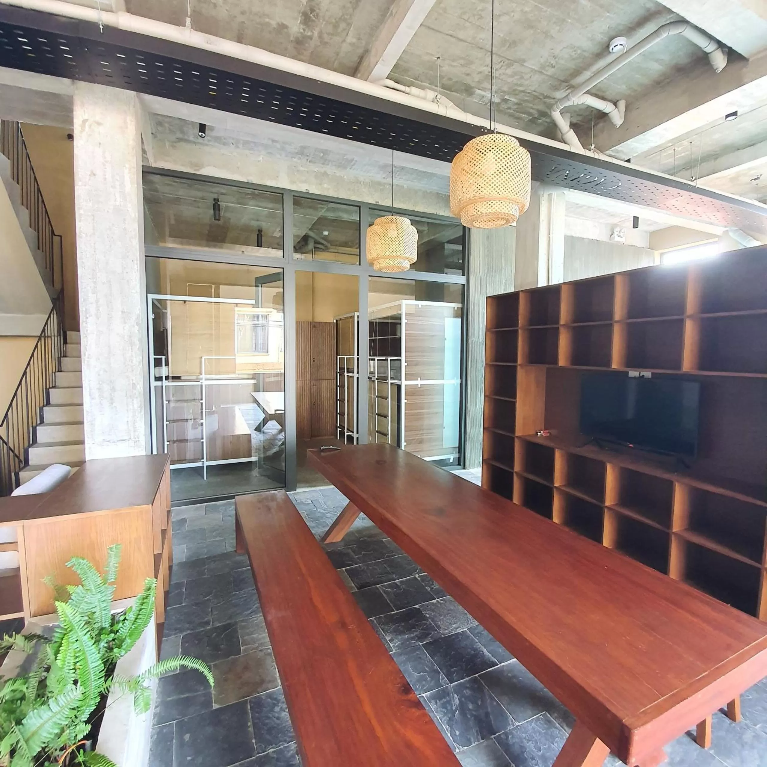 Communal lounge/ TV room in Cagina Boutique Hostel