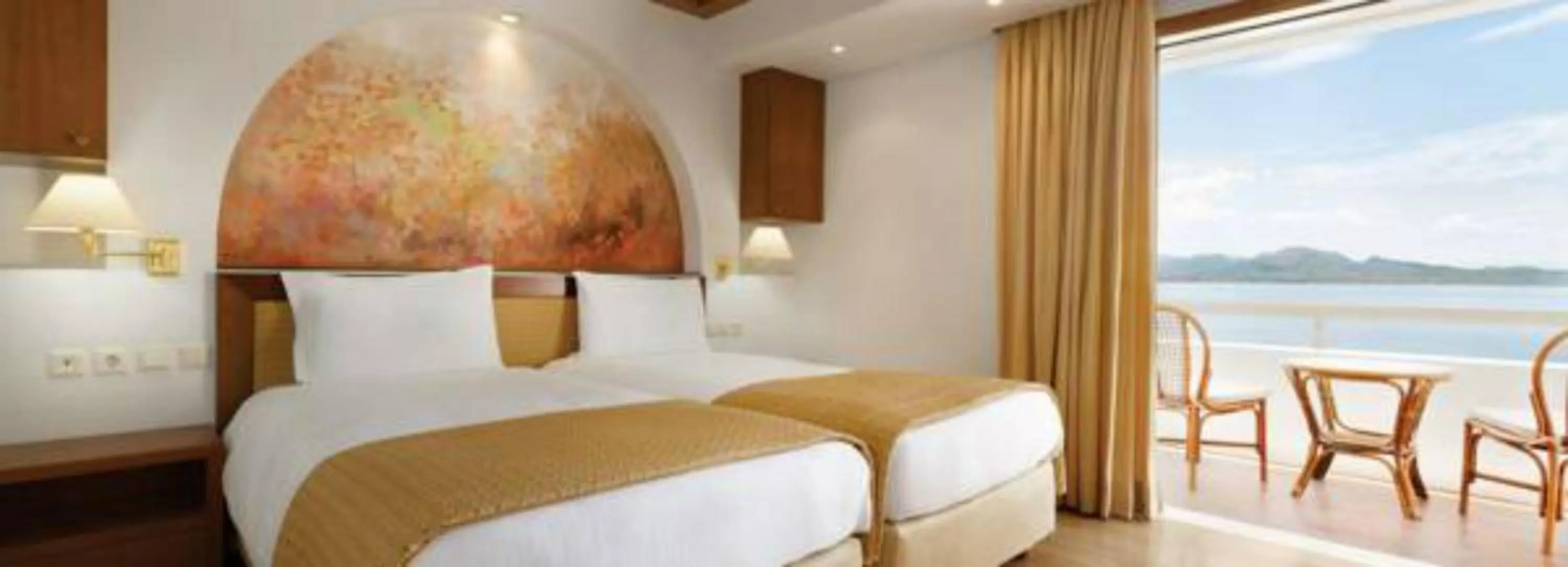 Balcony/Terrace, Bed in Ramada Loutraki Poseidon Resort