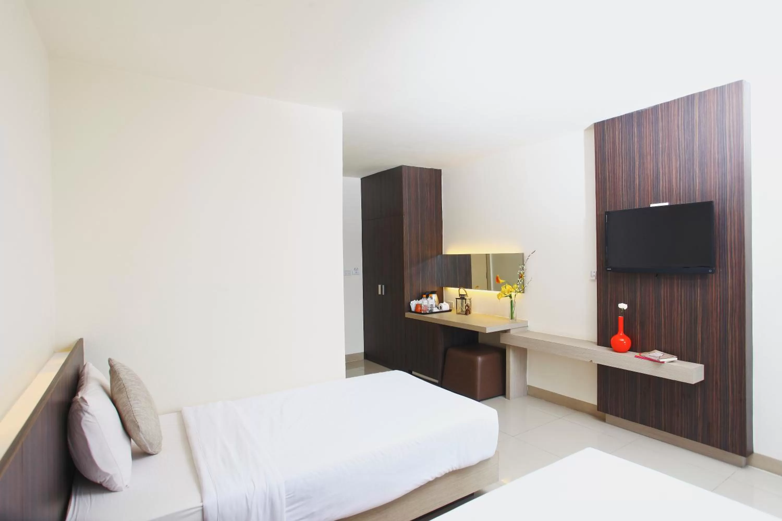 Bed in Leenova Hotel