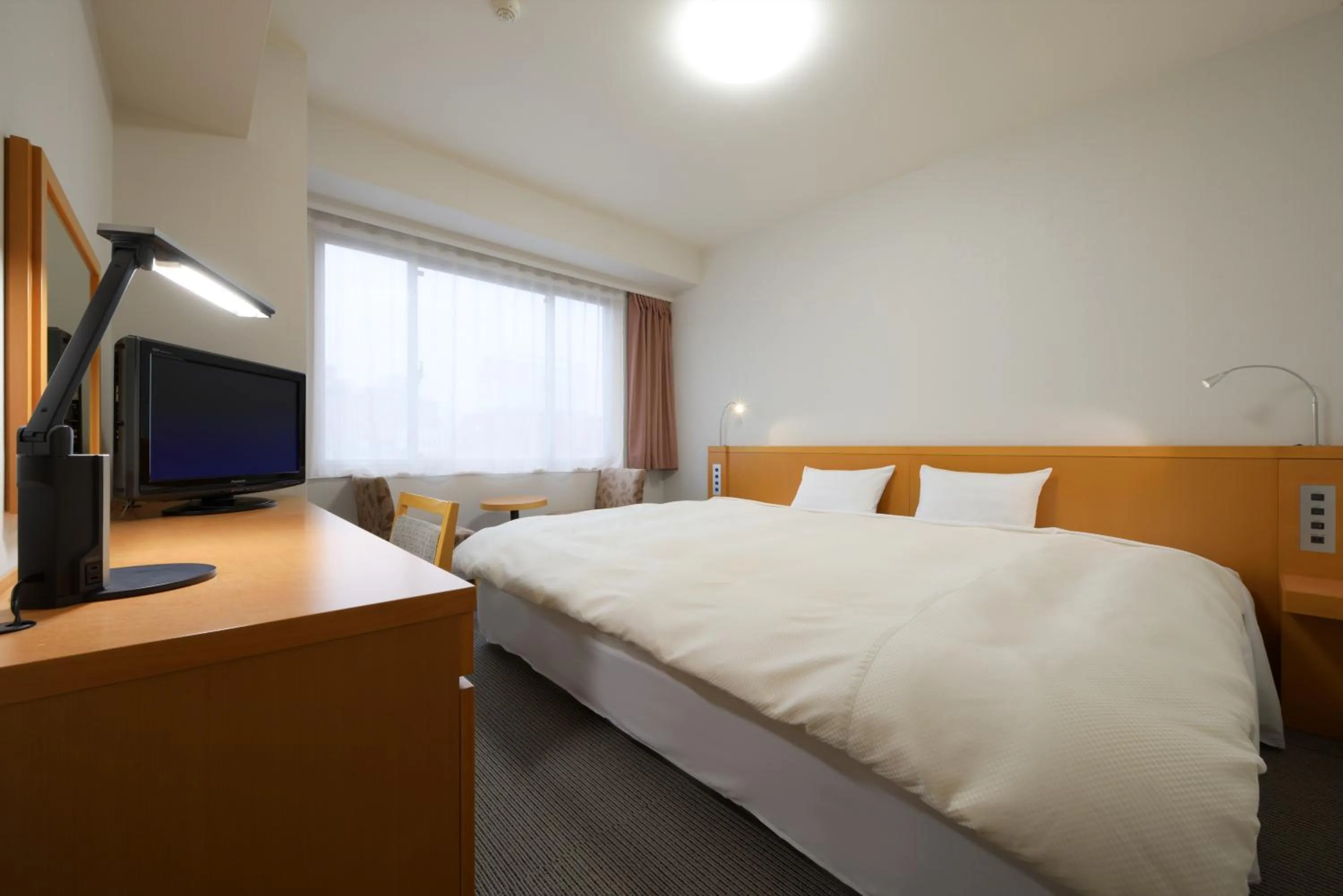 Bedroom, Bed in Grand Park Hotel Odate