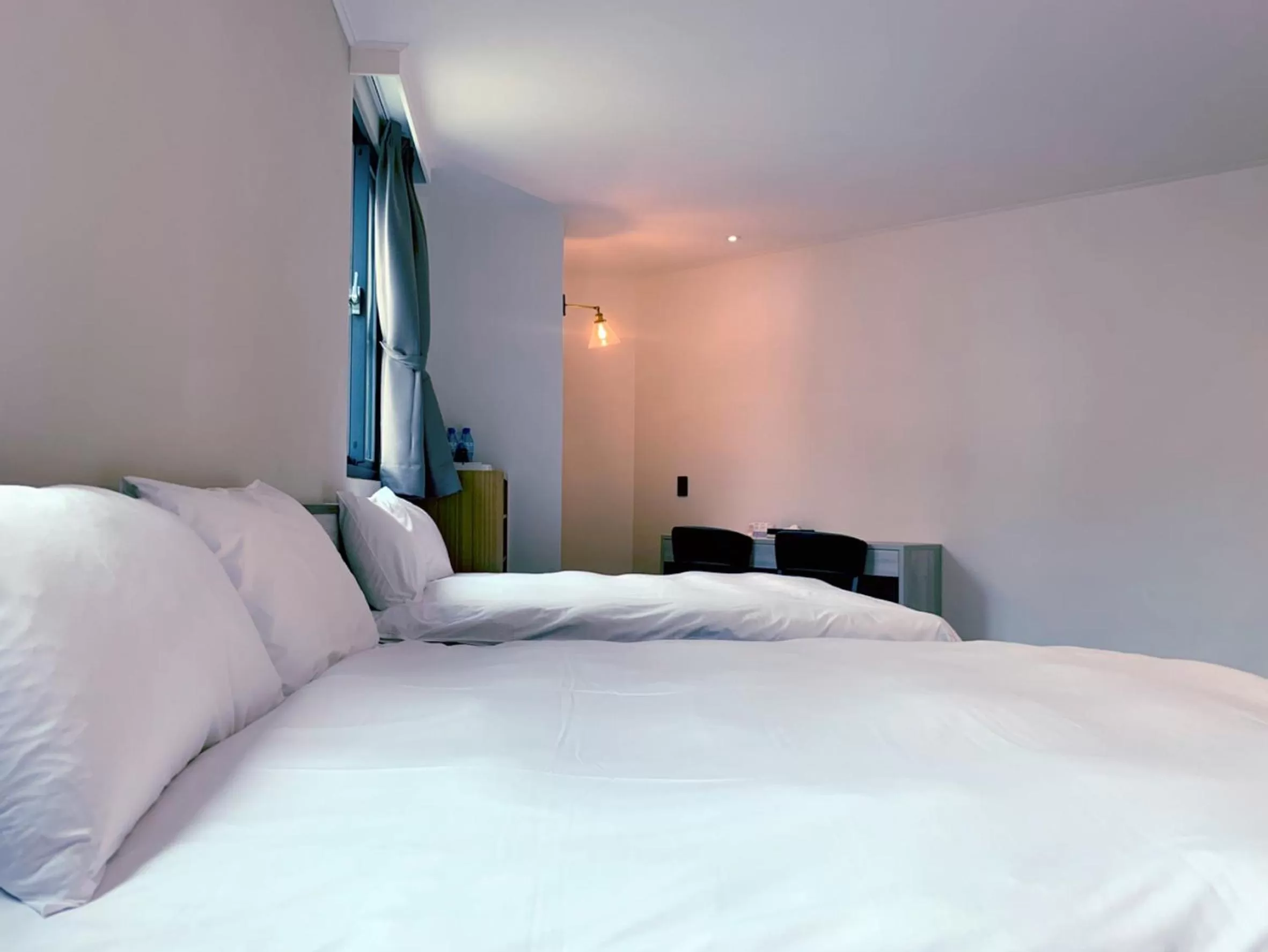 Bed in Raise Hotel Taichung