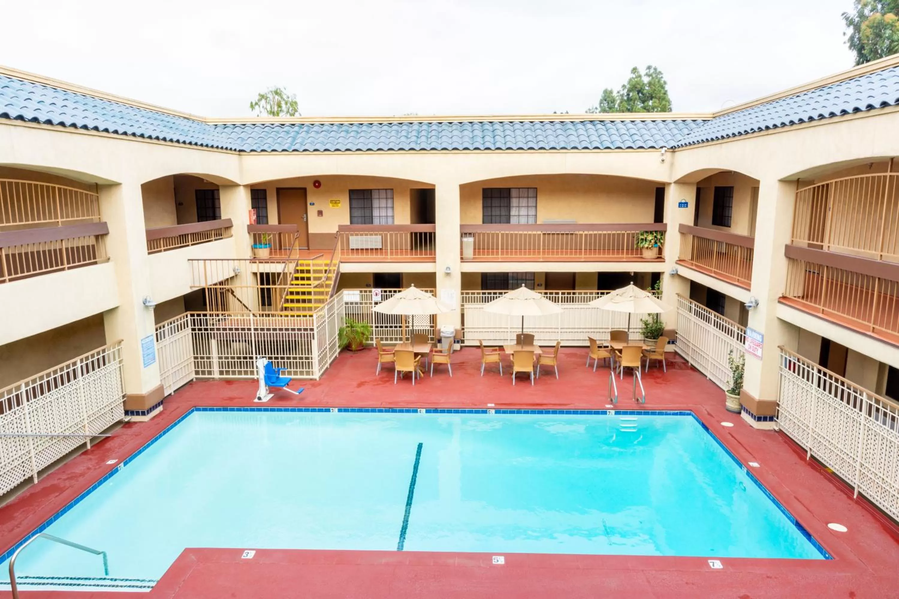 Swimming pool in Days Inn & Suites by Wyndham Artesia