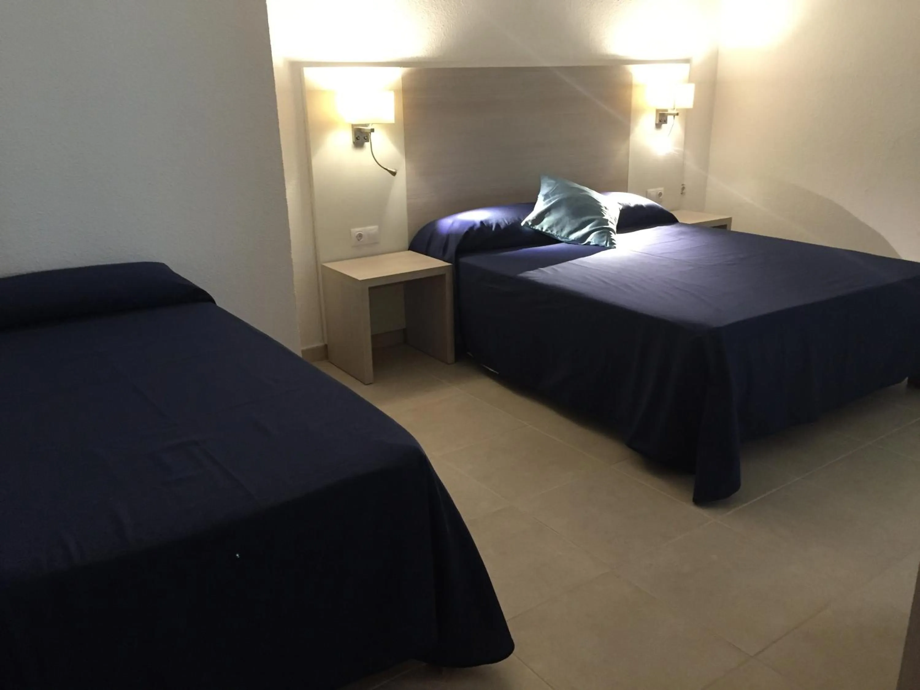 Bed in Hotel Antares