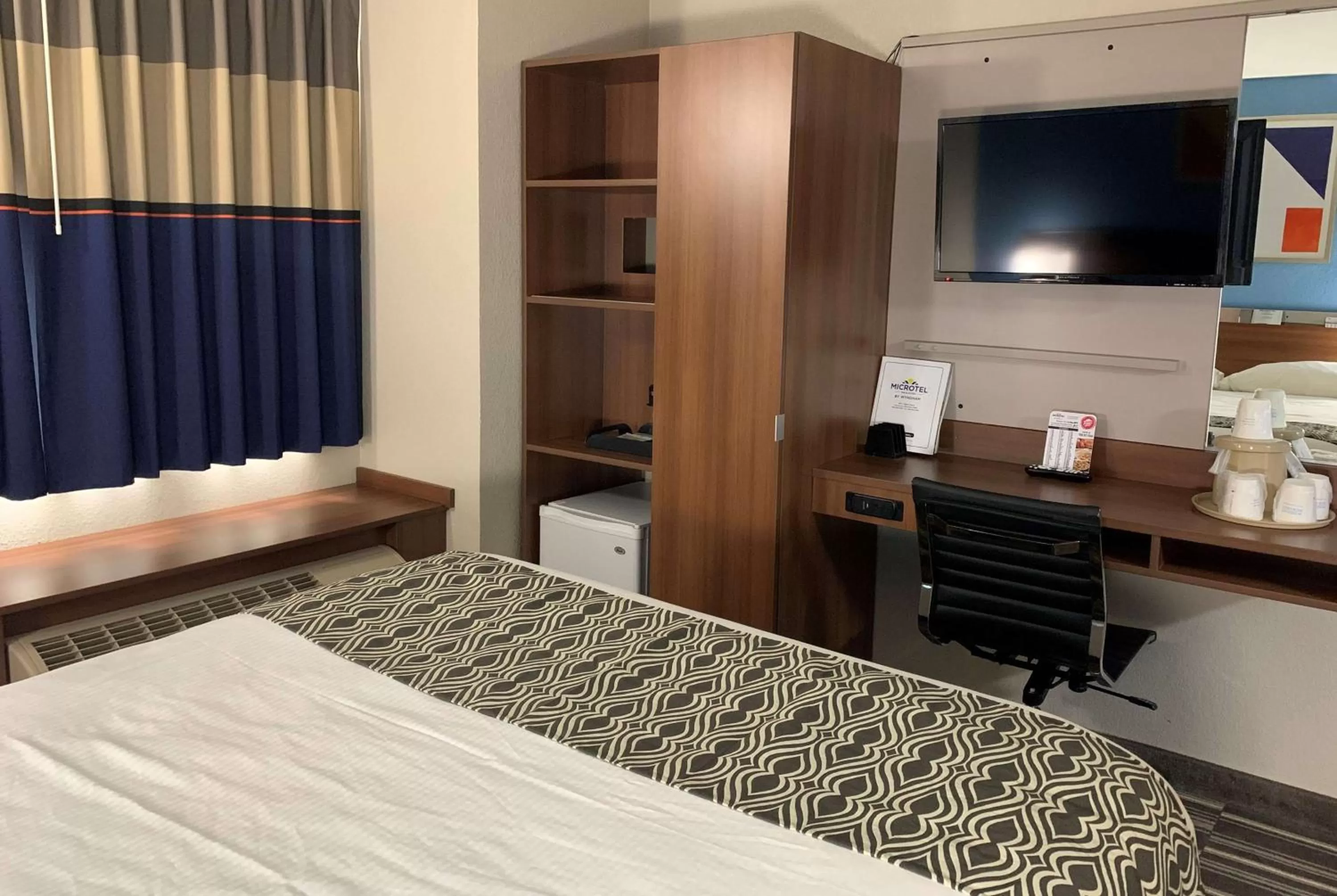 Photo of the whole room, Bed in Microtel Inn & Suites by Wyndham Fond Du Lac